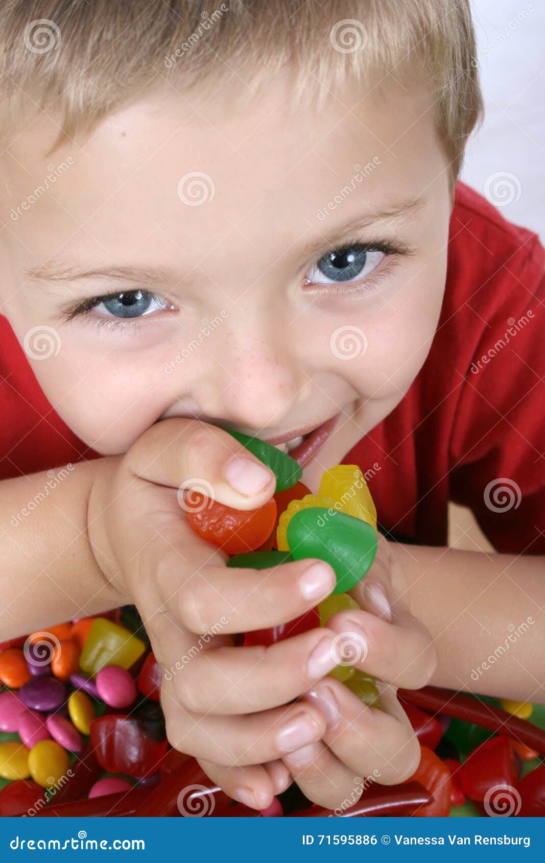 Boy with candy stock photo. Image of sweet, delicious 71595886