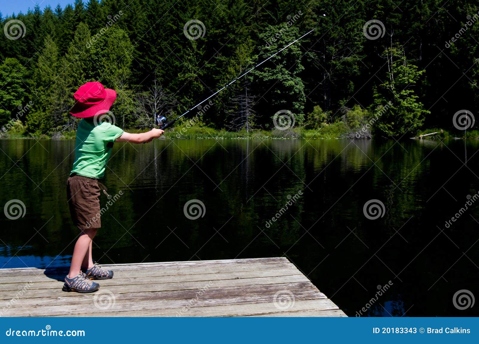 Boy casting fishing line stock image. Image of casting - 20183343