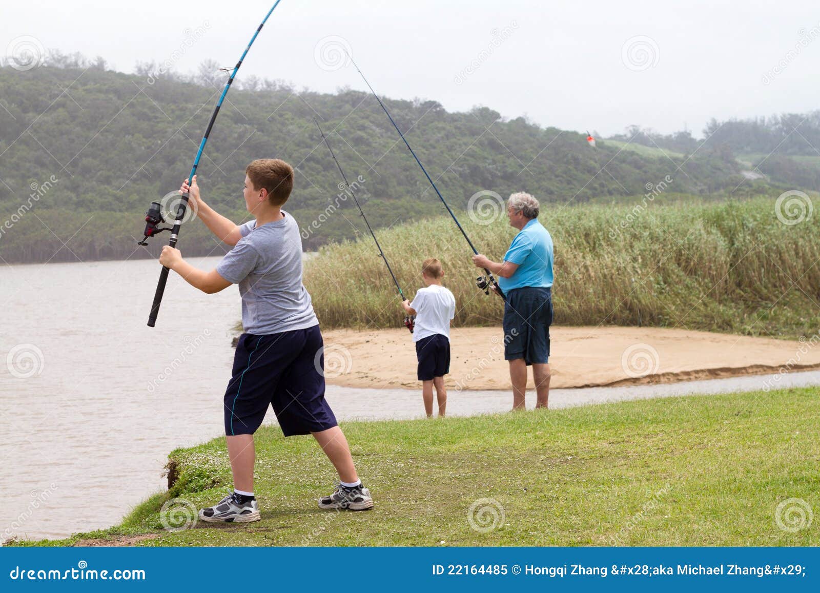 Boy casting fishing rod