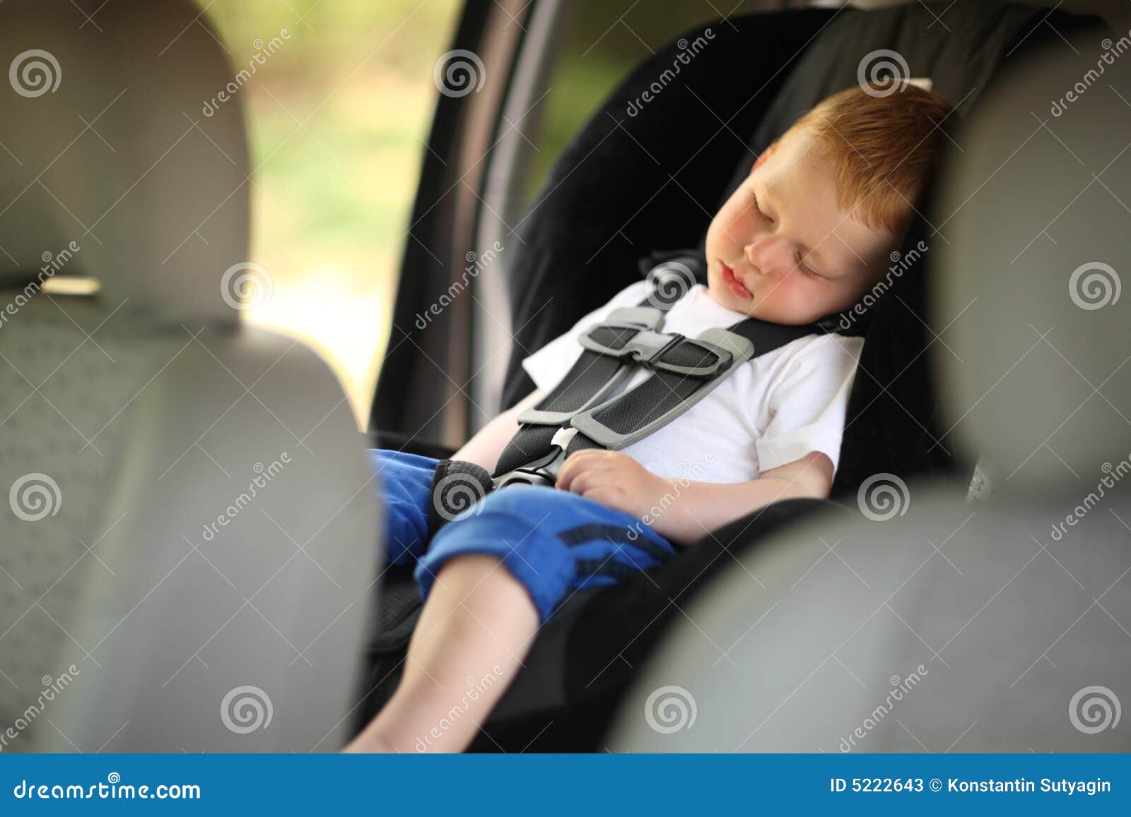 Boy in child car seat stock image. Image of safety, horizontal 5222643