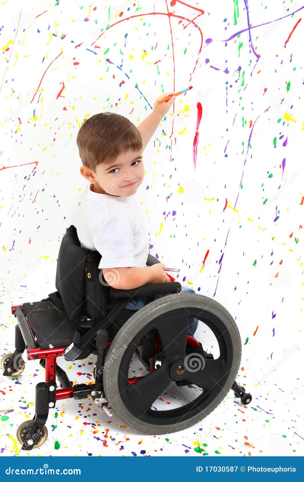 boy child painting wheelchair disability