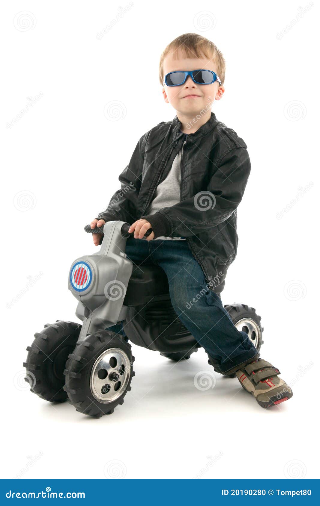 Boy on child s motorcycle stock photo. Image of happy 20190280