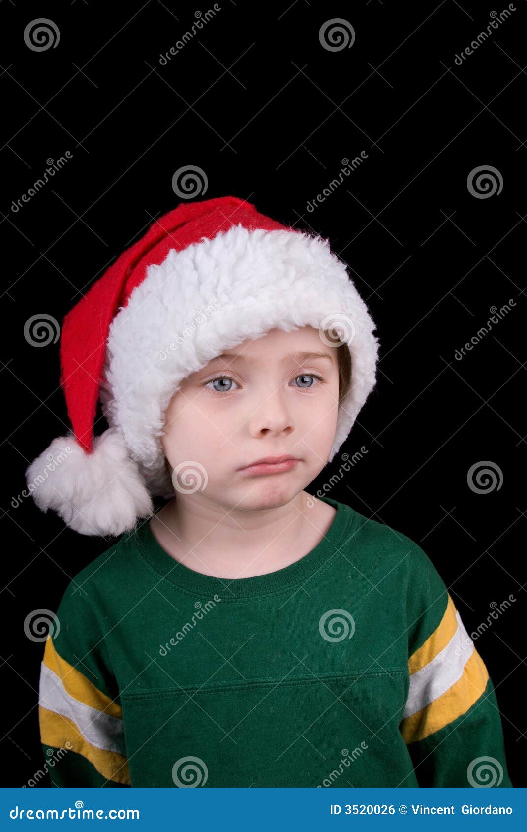 Boy in Christmas hat stock photo. Image of party, event 3520026