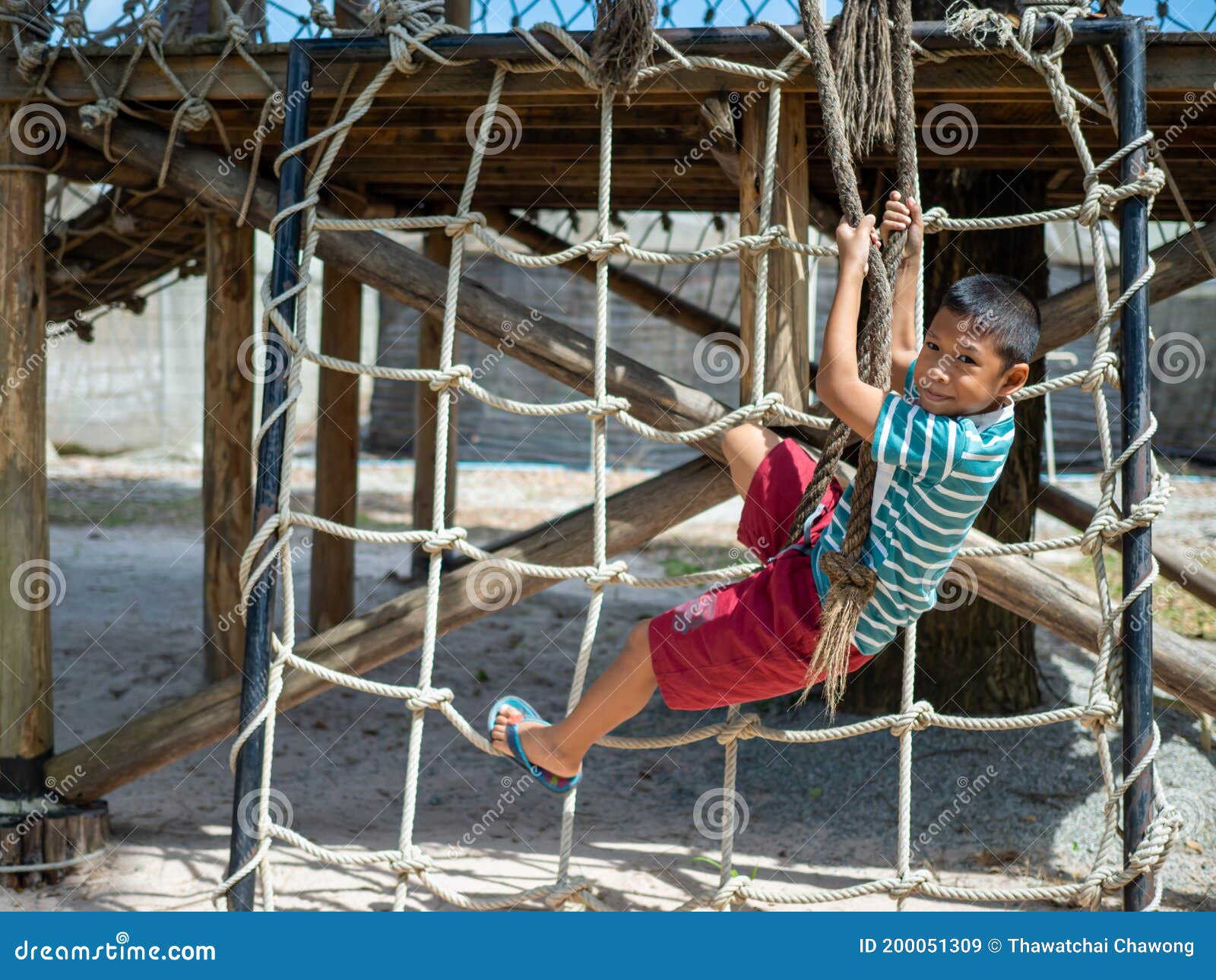 Boy Climbing a Rope Ladder in the Playground Stock Image - Image of  childhood, enjoy: 200051309