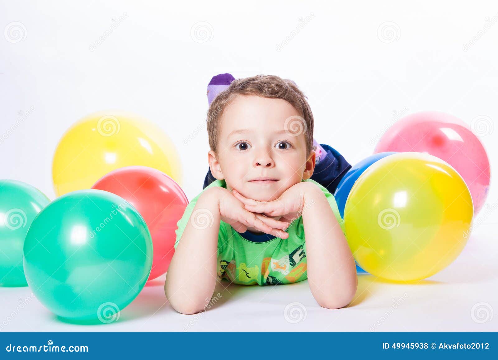 Boy with colorful balloons stock photo. Image of birthday - 49945938
