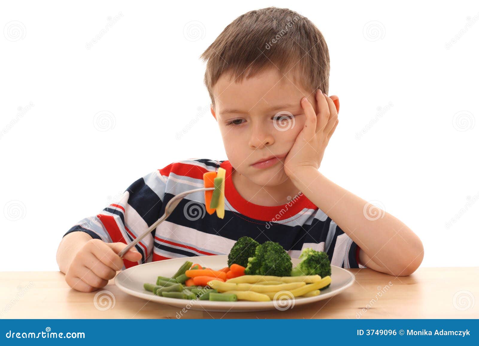 Boy and cooked vegetables stock photo. Image of child 3749096