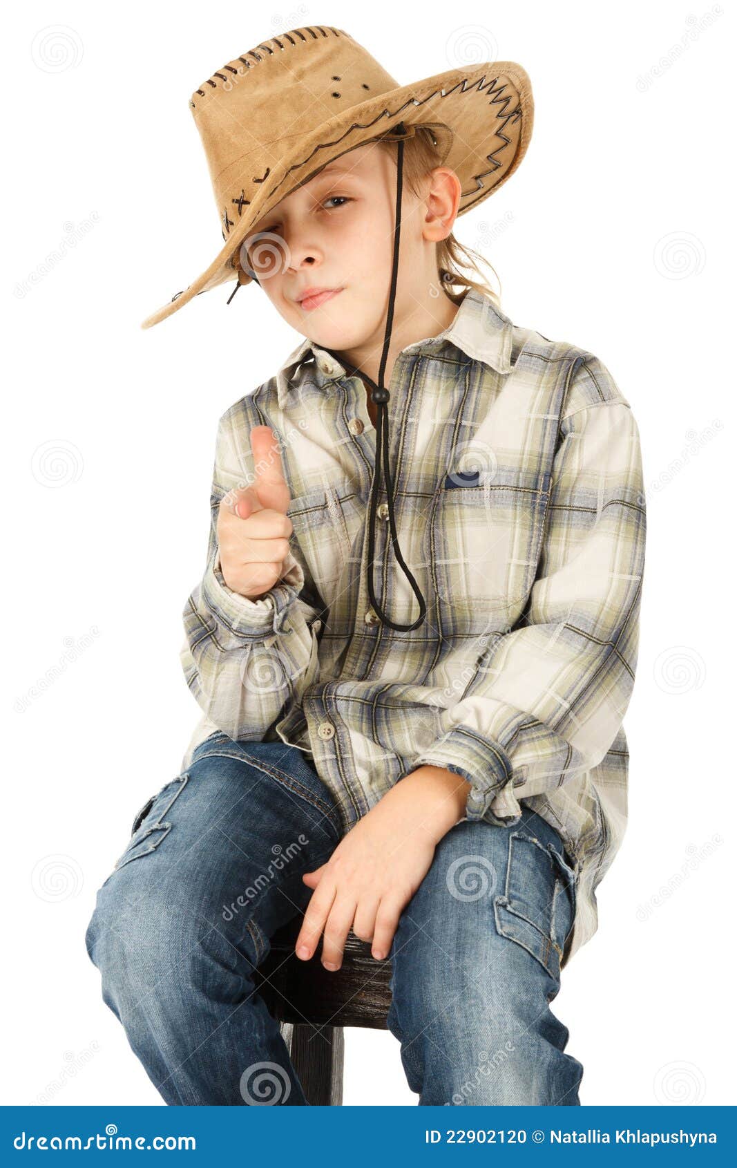 Boy in cowboy hat stock photo. Image of pointing, white 22902120