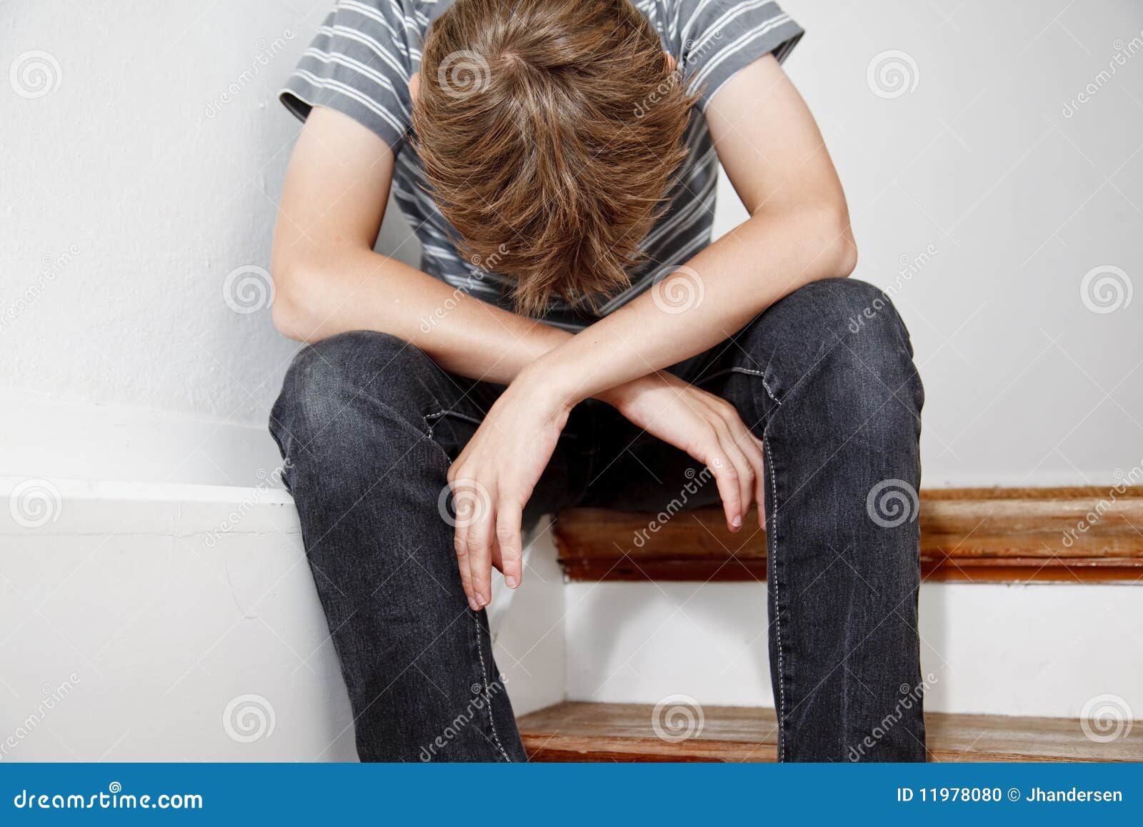 Boy Crying while Sitting on the Stairs Stock Photo - Image of ...