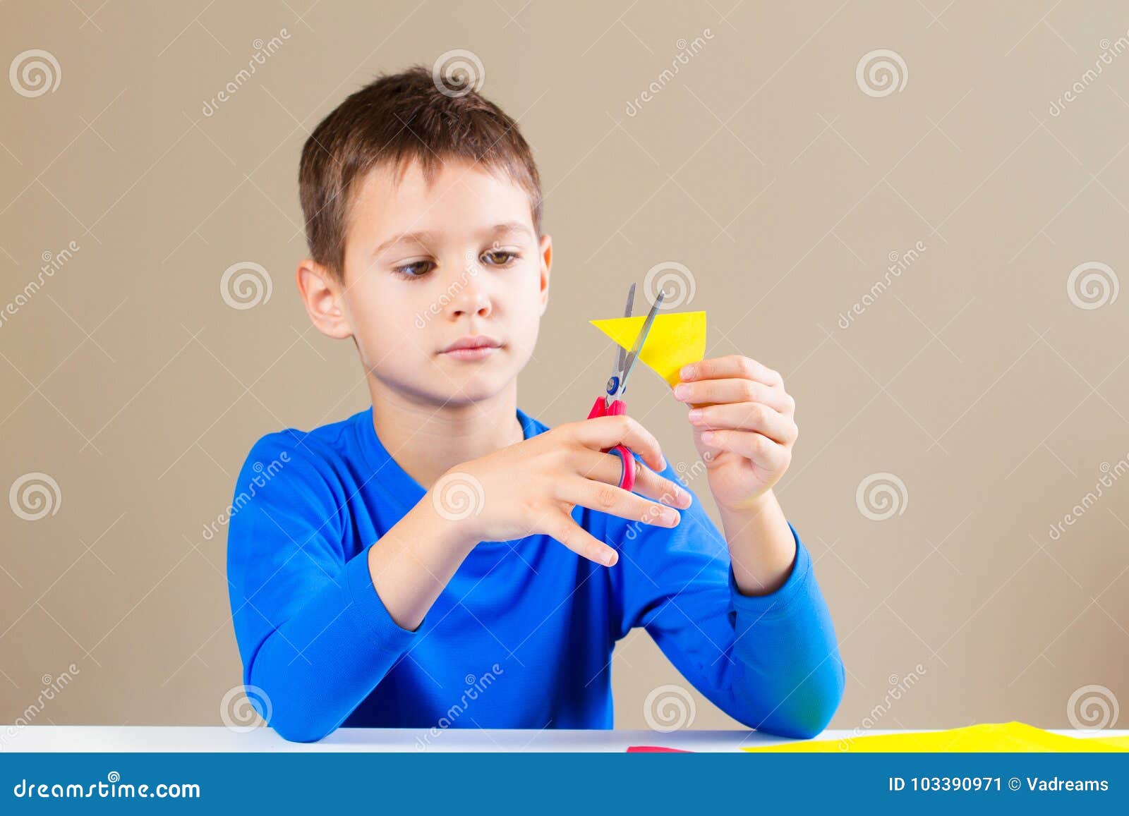 Boy Cutting Colored Paper with Scissors Stock Image Image of learning