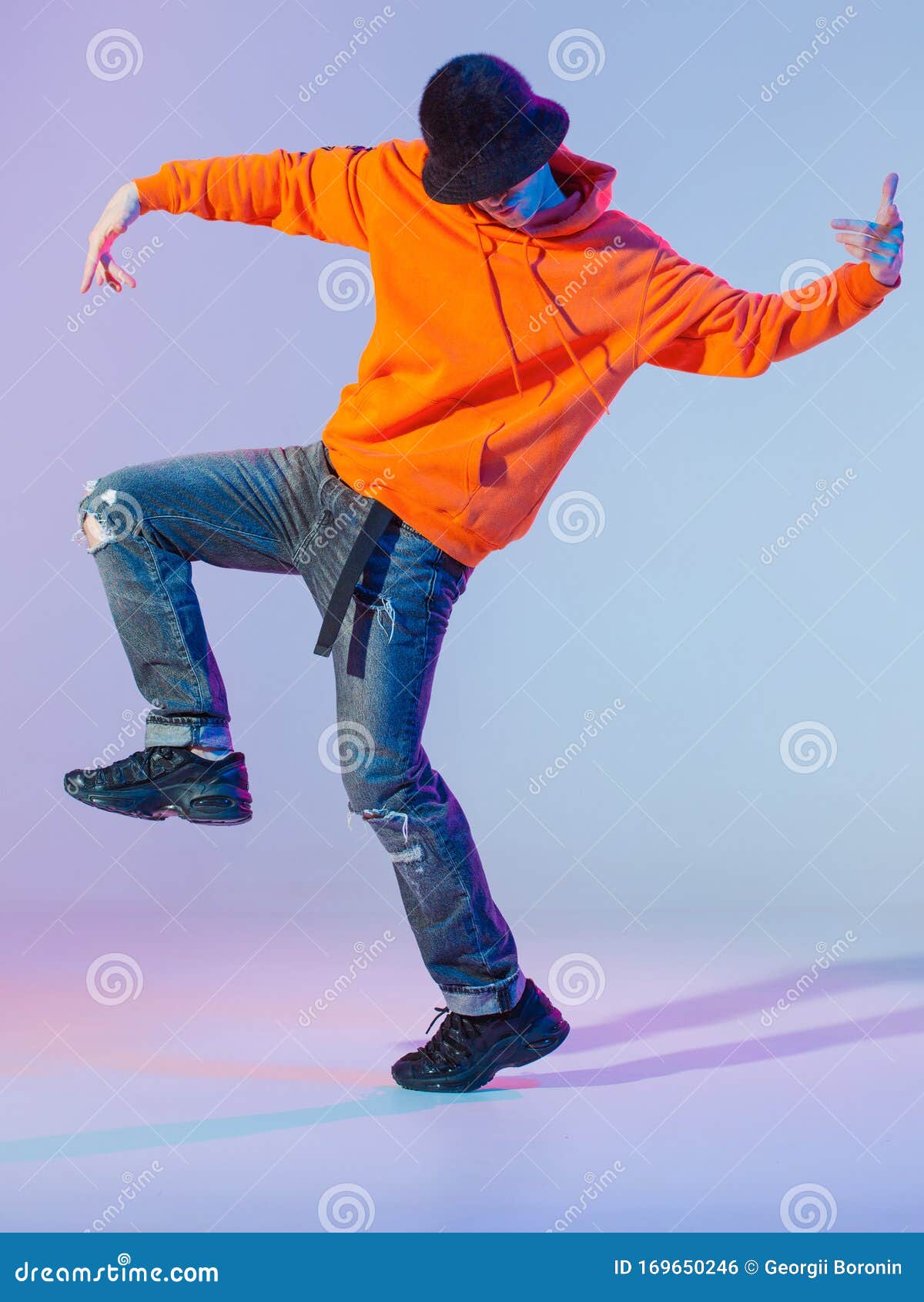 Boy Dancing Contemporary Dance in Studio. Breakdancing. Stock Photo