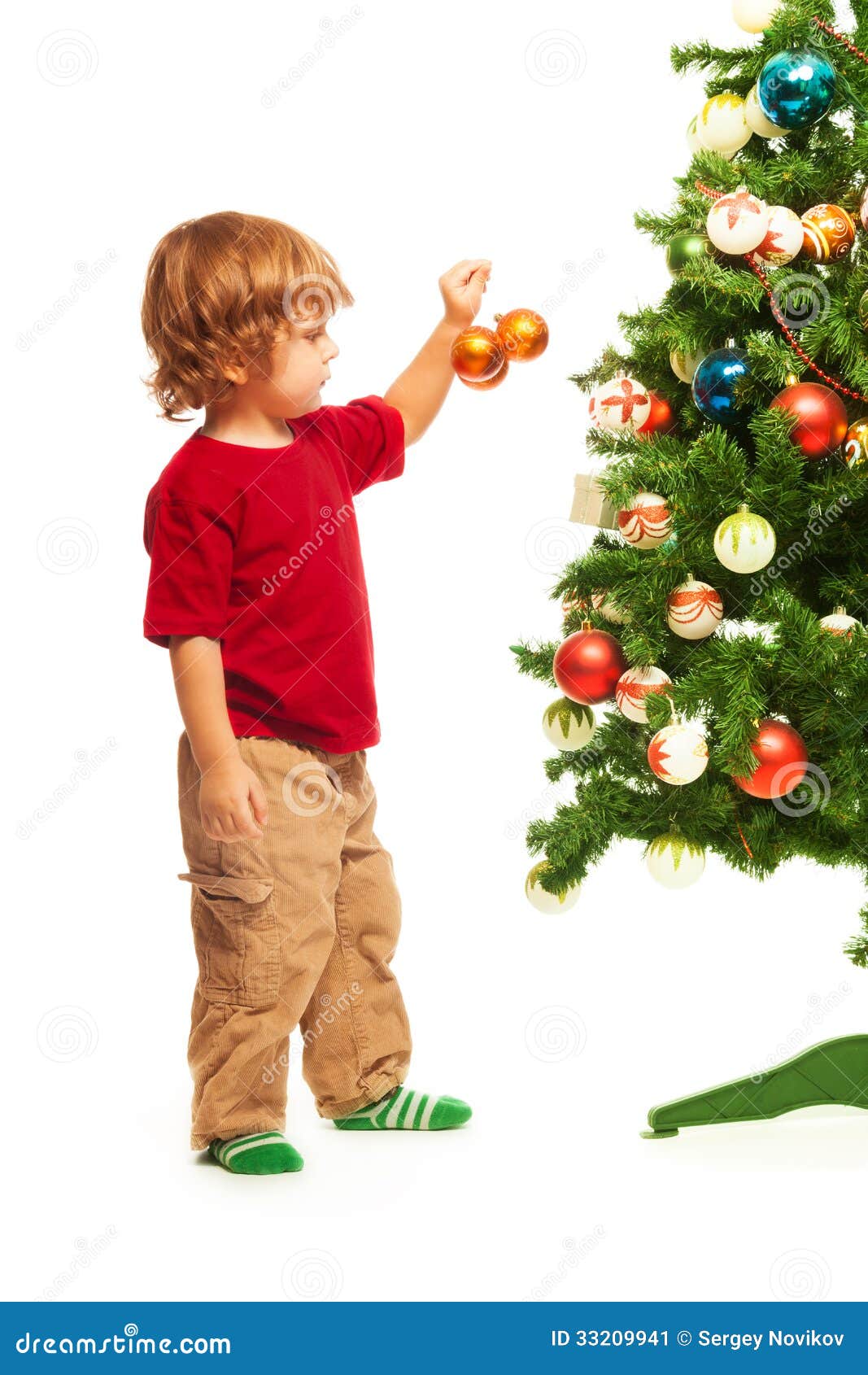 Boy Decorating Christmas Tree Stock Image Image of decorate, portrait