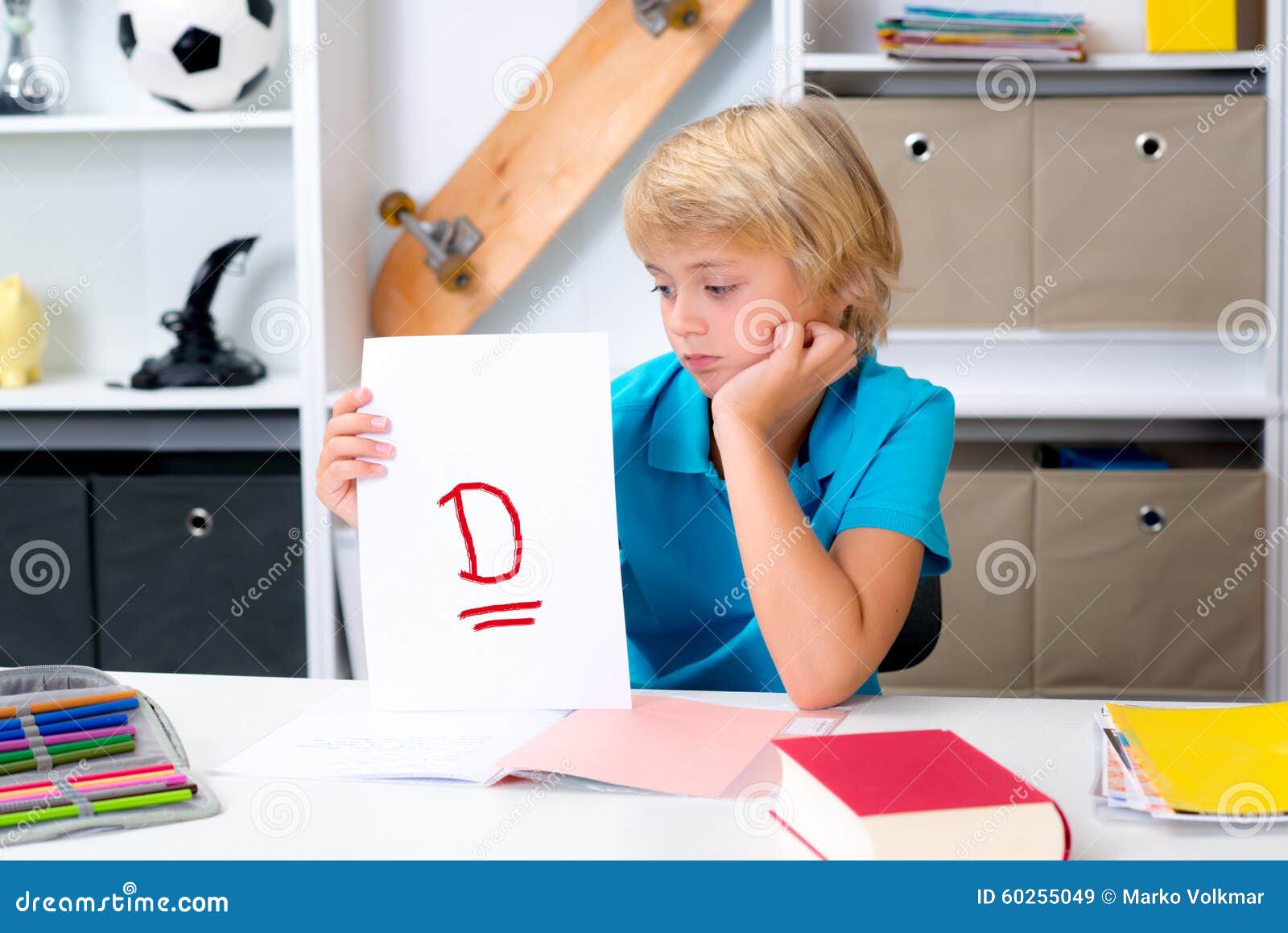 Boy on Desk with Bad Report Card Stock Image Image of student, report