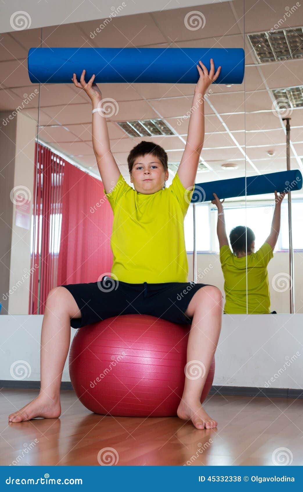 Boy Does Exercise in the Gym Stock Photo Image of vitality, large
