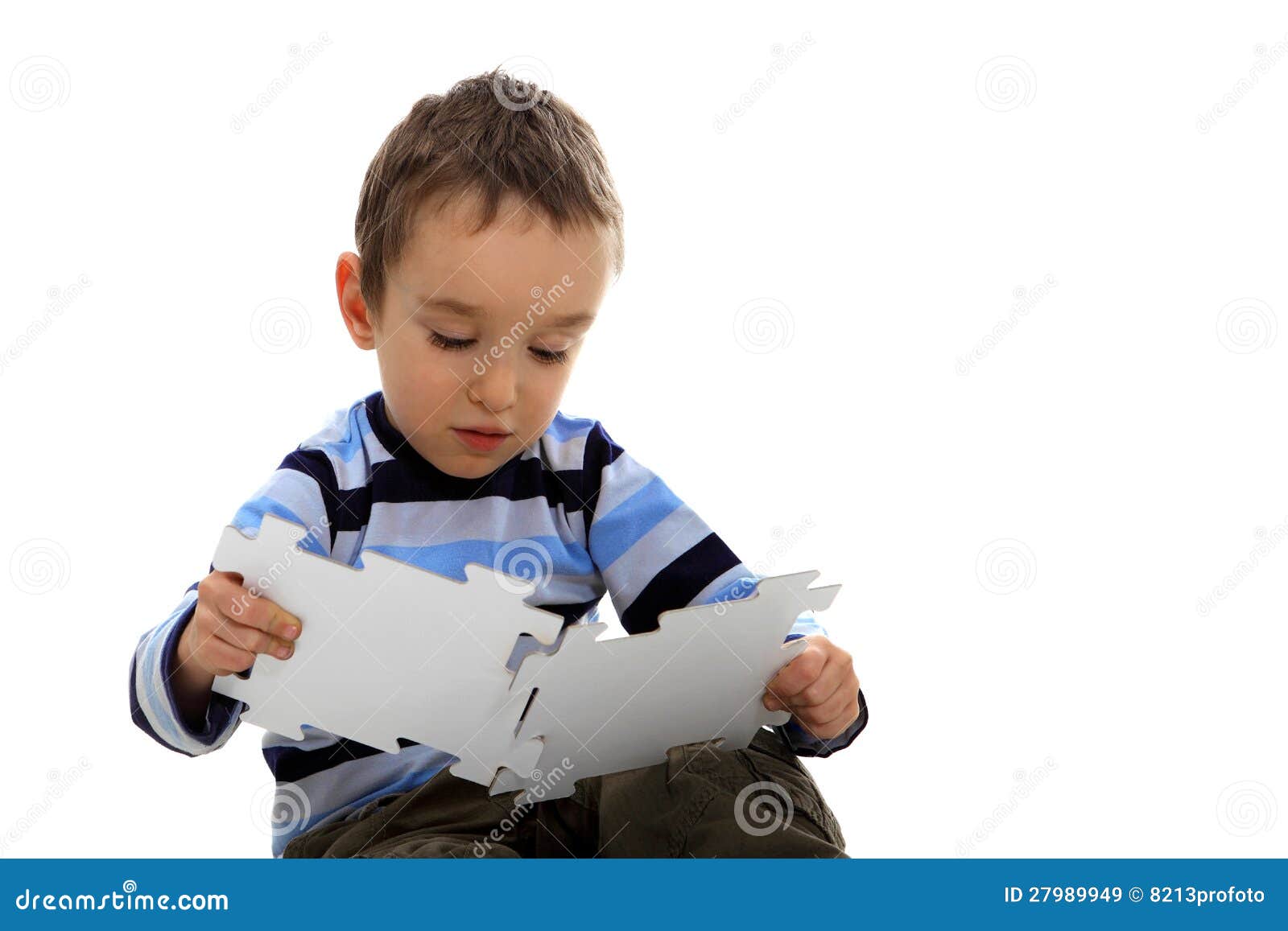 Boy Doing a Jigsaw on the White Background Stock Image Image of