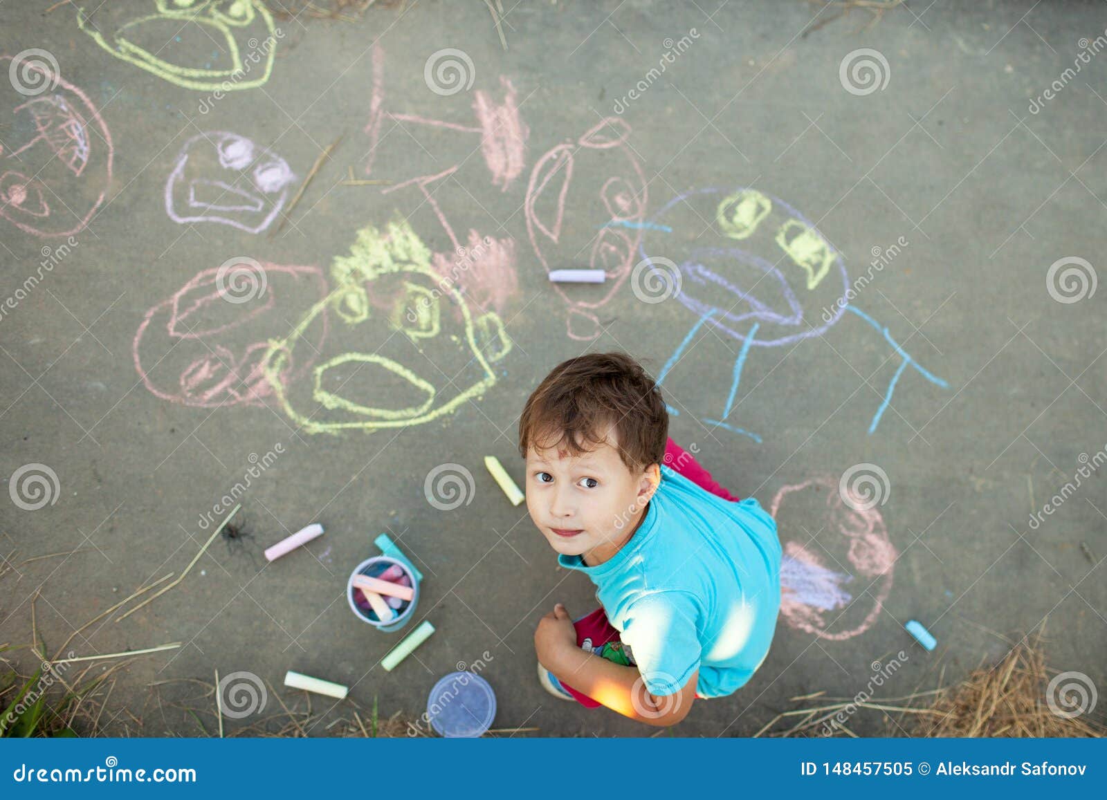 Boy Draws with Chalk on the Pavement Stock Image Image of child, cute