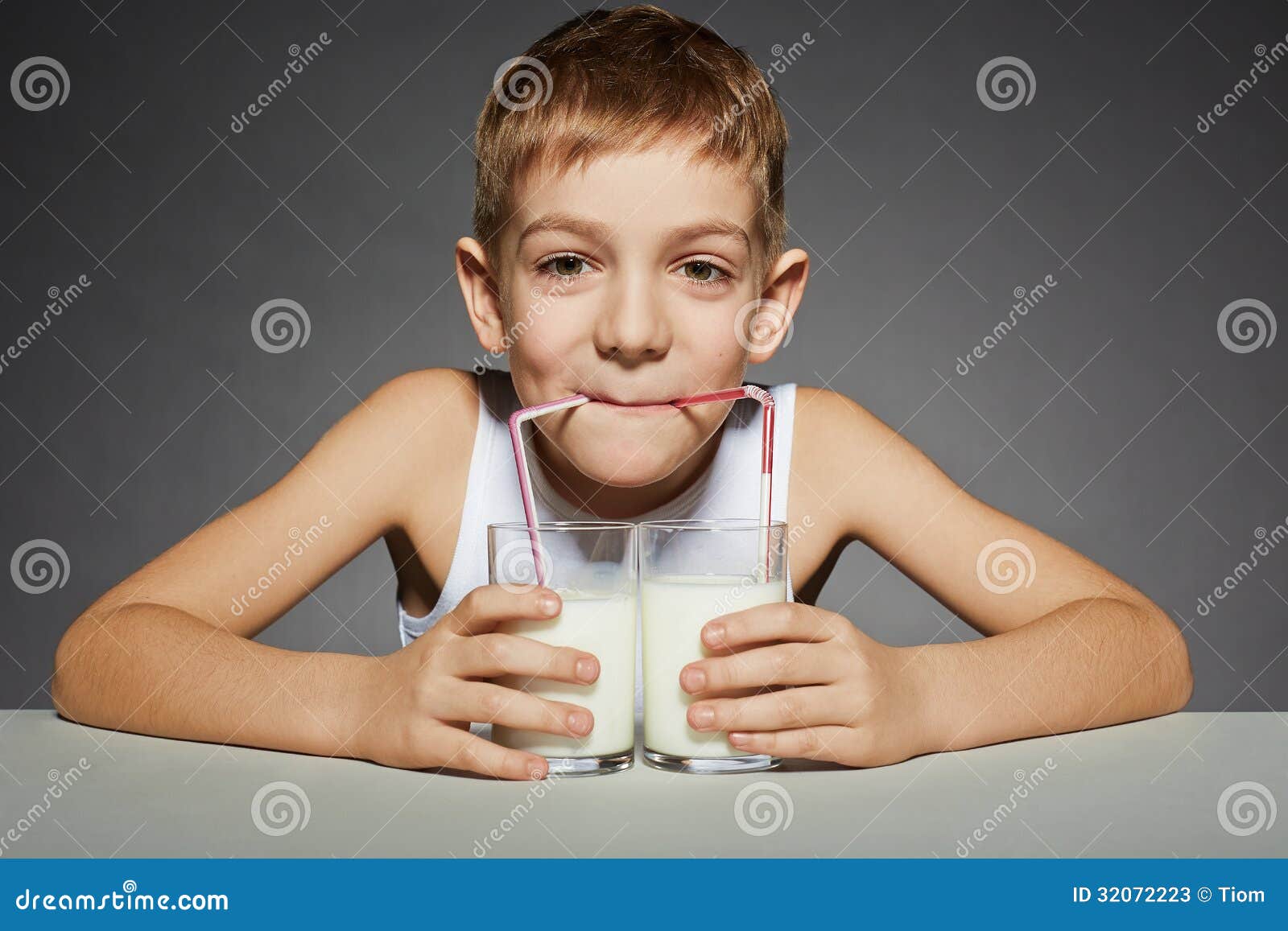 Boy Drinking Milk from Two Glasses Stock Image Image of bottle, food