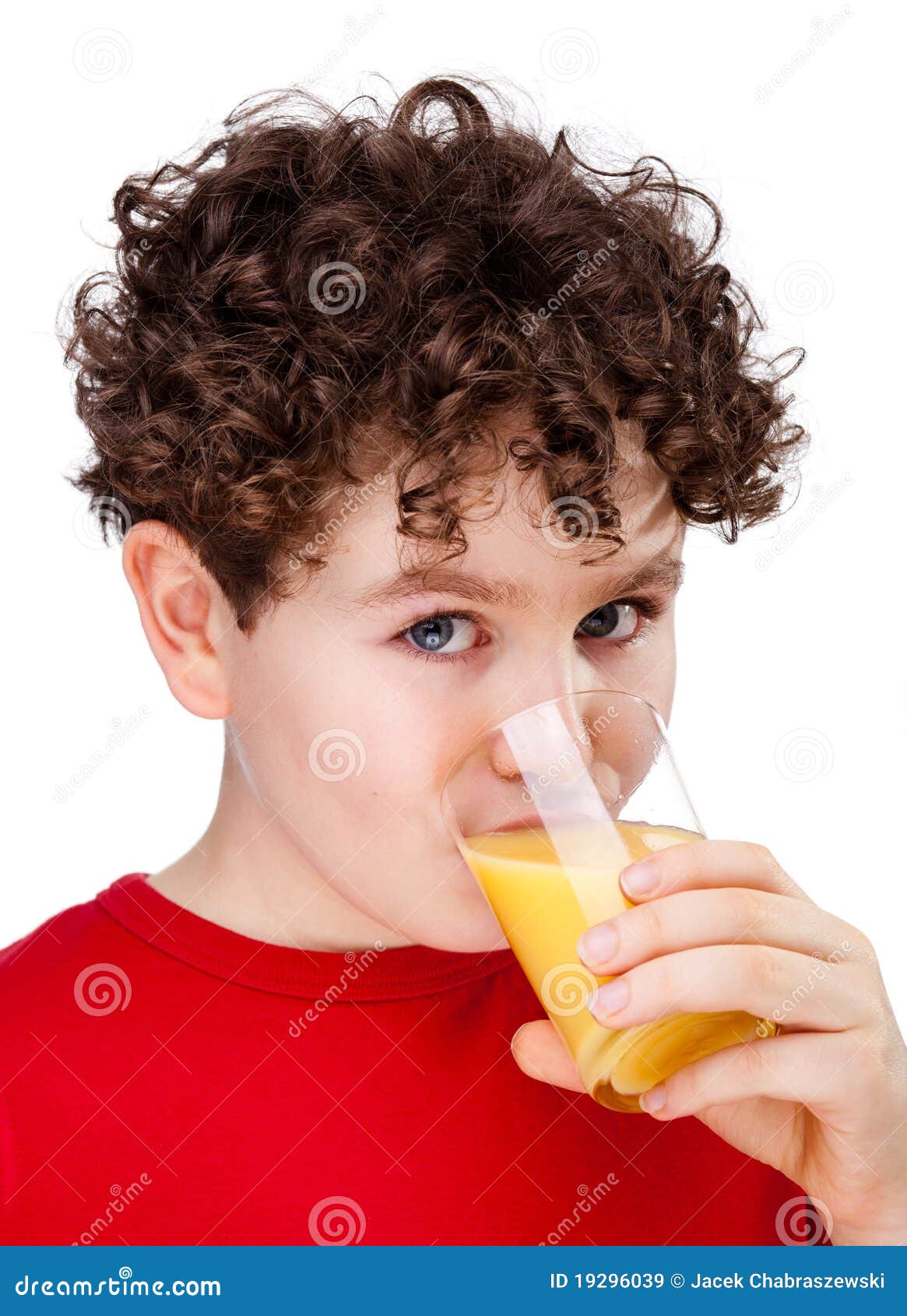 Boy drinking orange juice stock image. Image of children 19296039