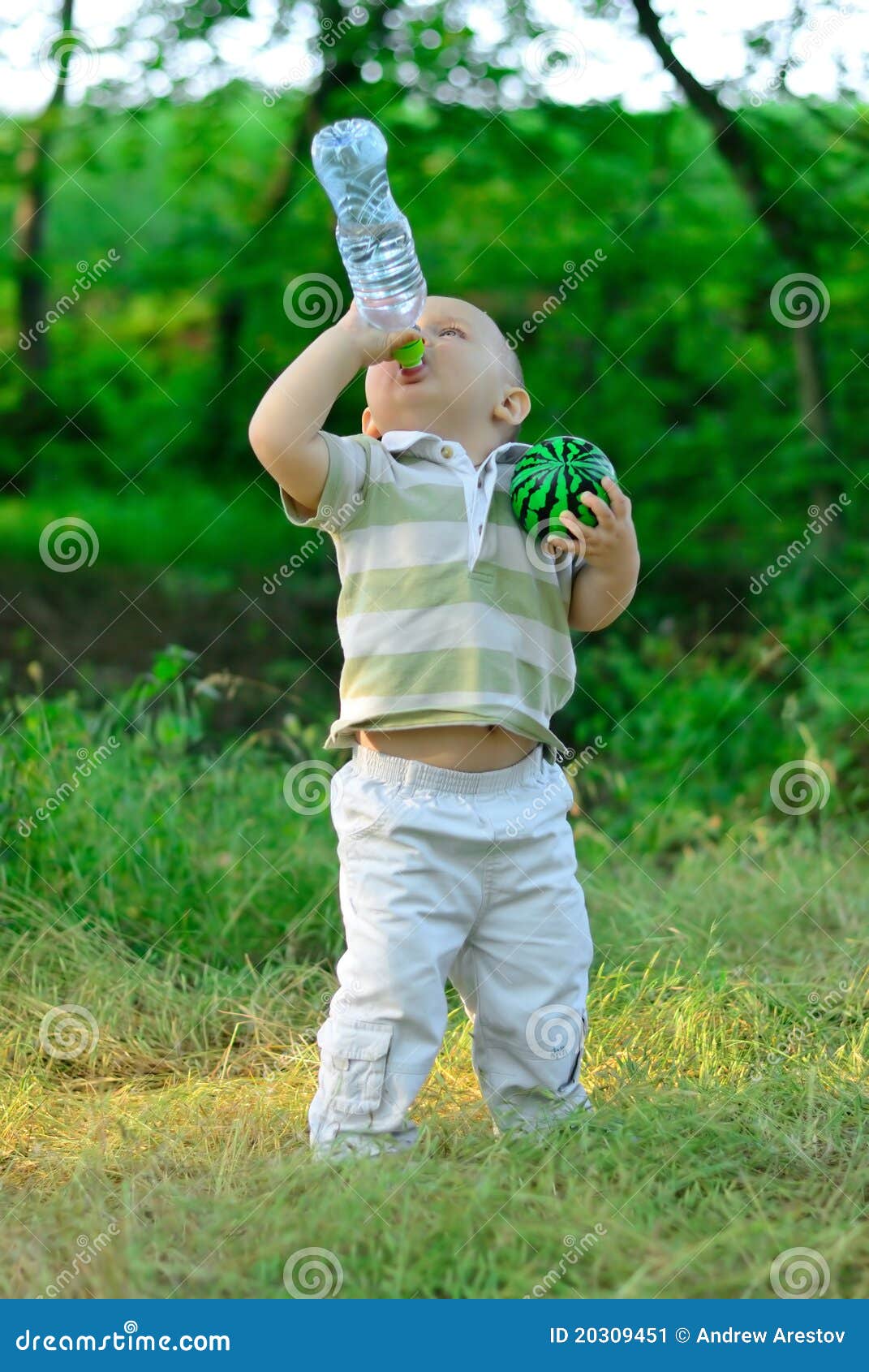 Boy Drinks Water from a Bottle Outdoors Stock Photo - Image of bottle,  happy: 62932108