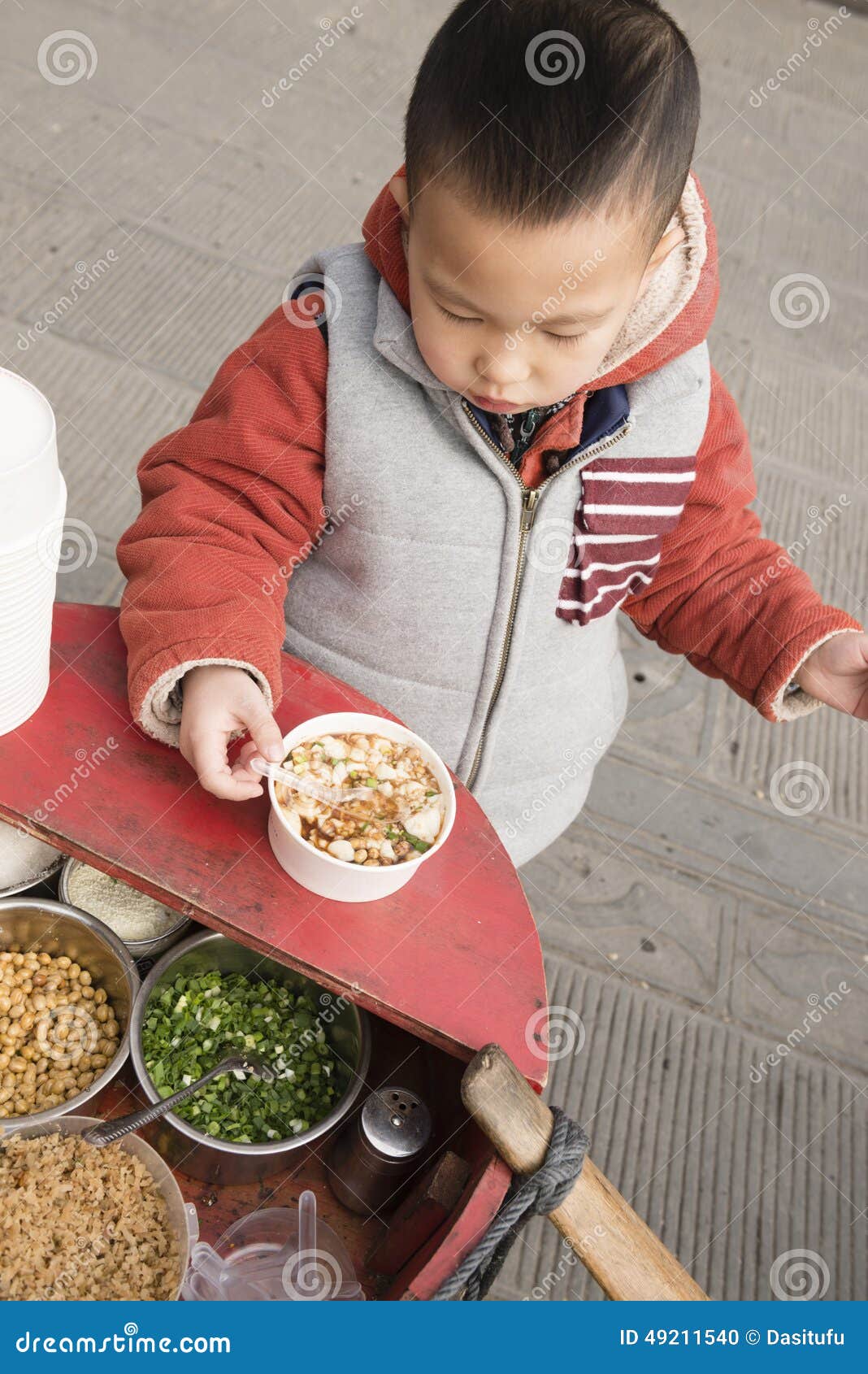 Boy Eating Bean Curd Pudding Stock Photo Image of bean, outdoor 49211540