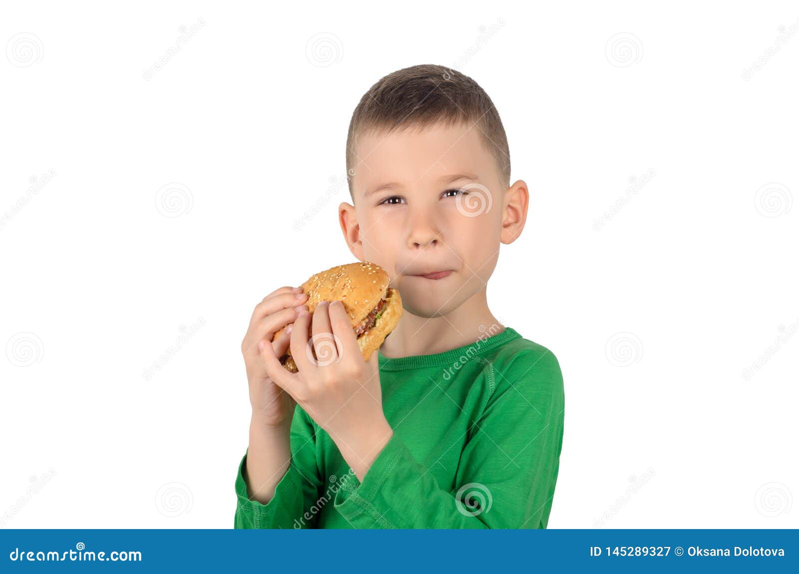 Boy eating burger stock image. Image of face, burger 145289327