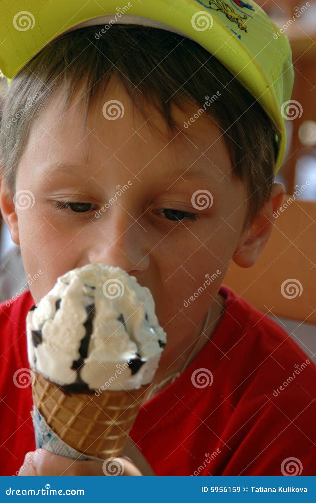 Boy eating ice cream cone stock image. Image of fattening 5956159