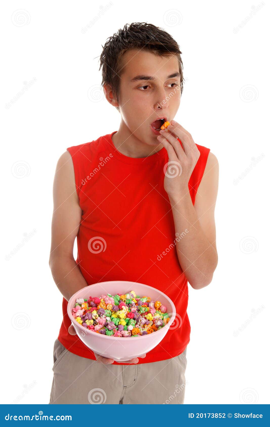Boy eating popcorn stock photo. Image of smiling, male 20173852
