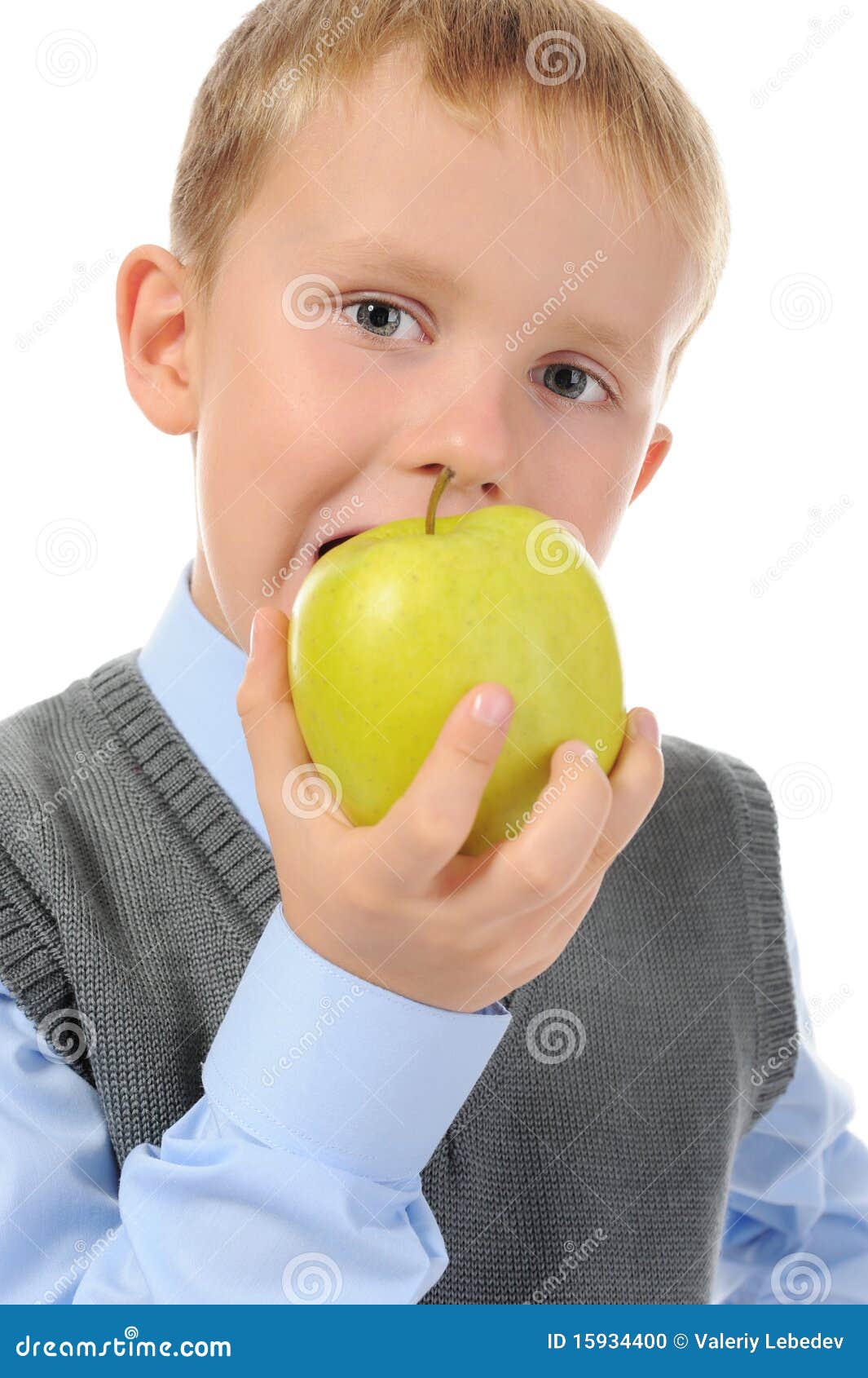 Boy eats an apple stock photo. Image of portrait, life 15934400