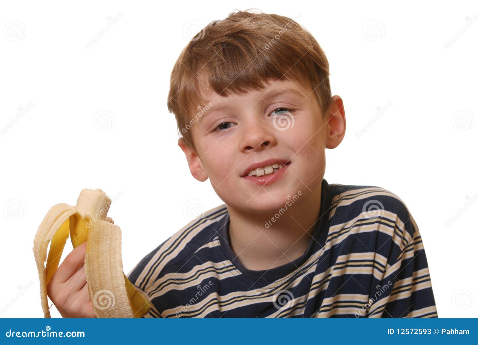 Boy eats a banana stock image. Image of youth, hand, hungry 12572593