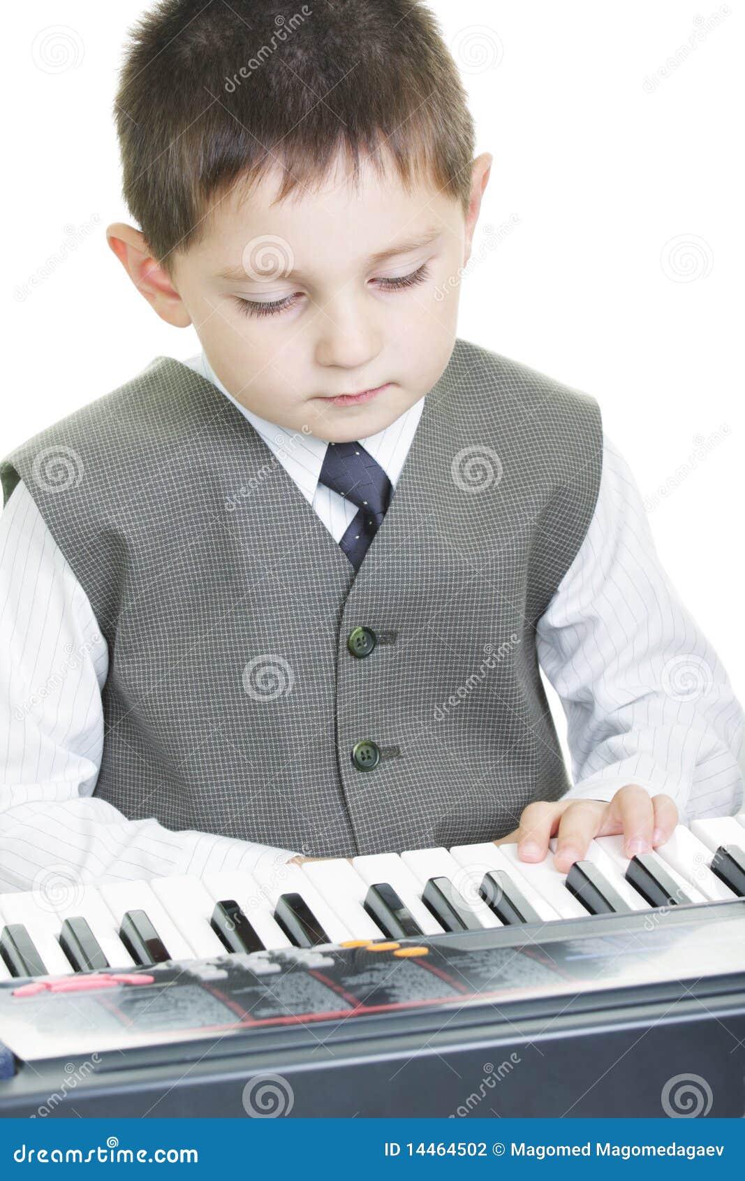 Boy and electric piano stock photo. Image of shirt, electric 14464502