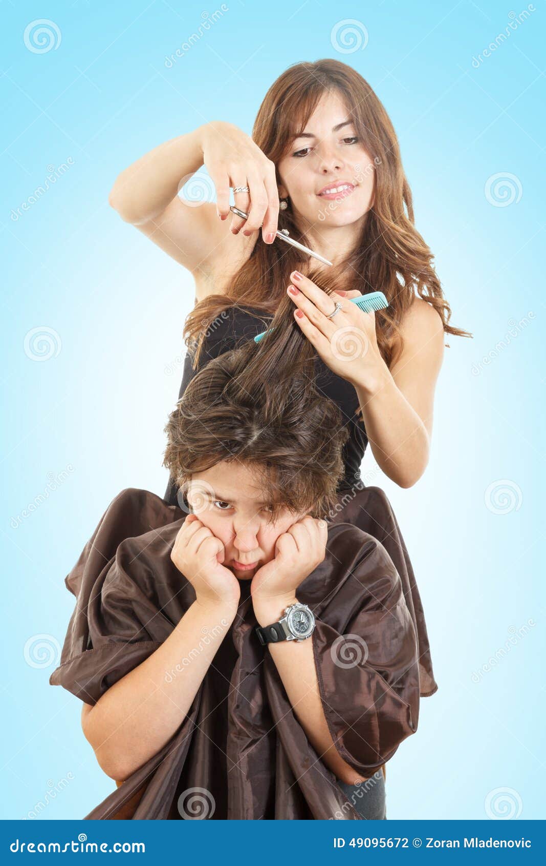 Boy With Face Expression With Long Hair At Hairdresser 