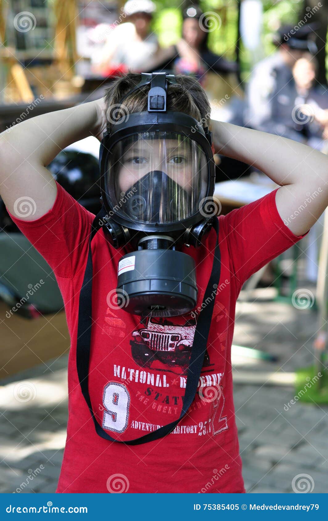 A boy in a gas mask stock image. Image of protection 75385405