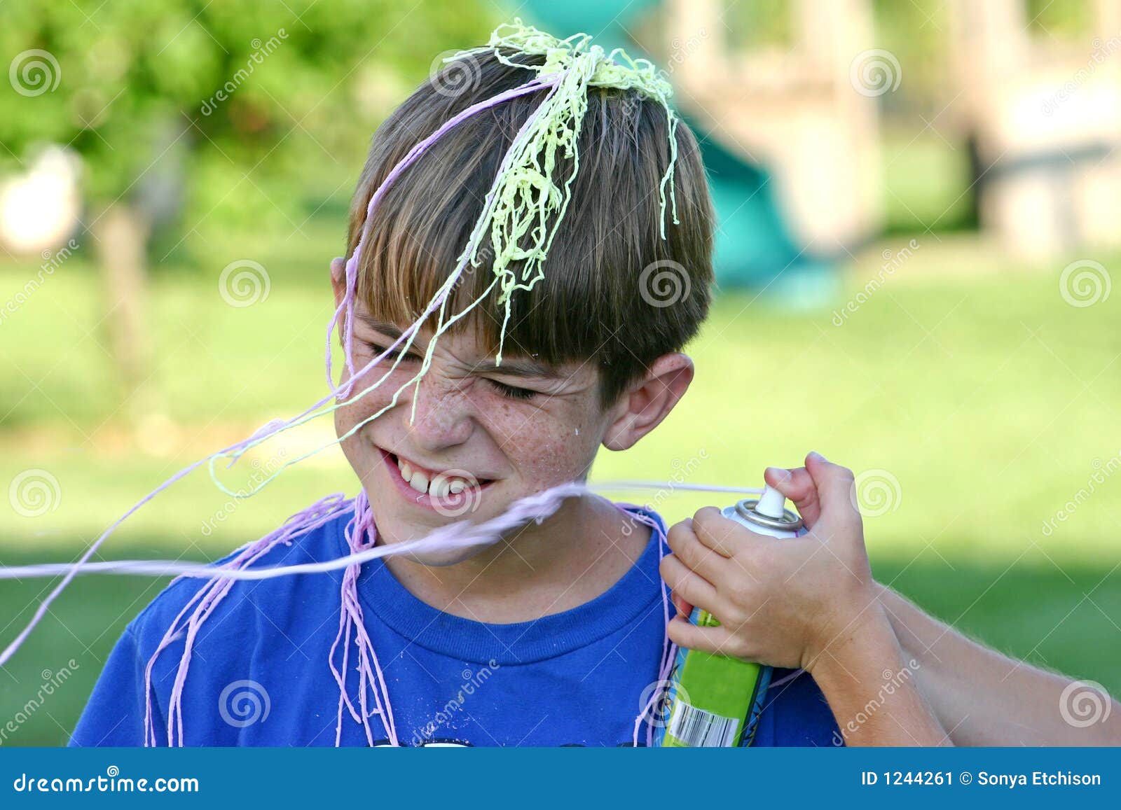 boy getting sprayed