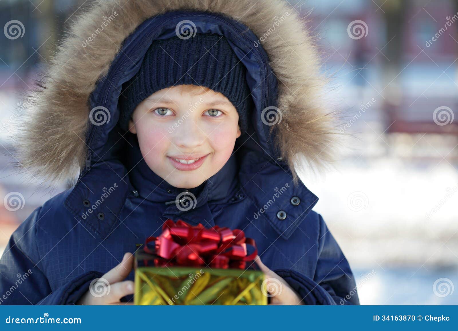 Boy with gift outdoors stock photo. Image of little, gift 34163870