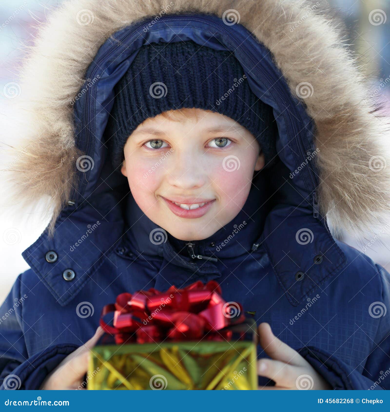 Boy with gift outdoors stock photo. Image of cute, decoration 45682268
