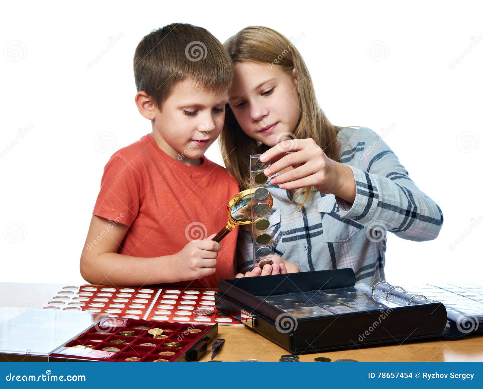 boy and girl are considering coin collection 