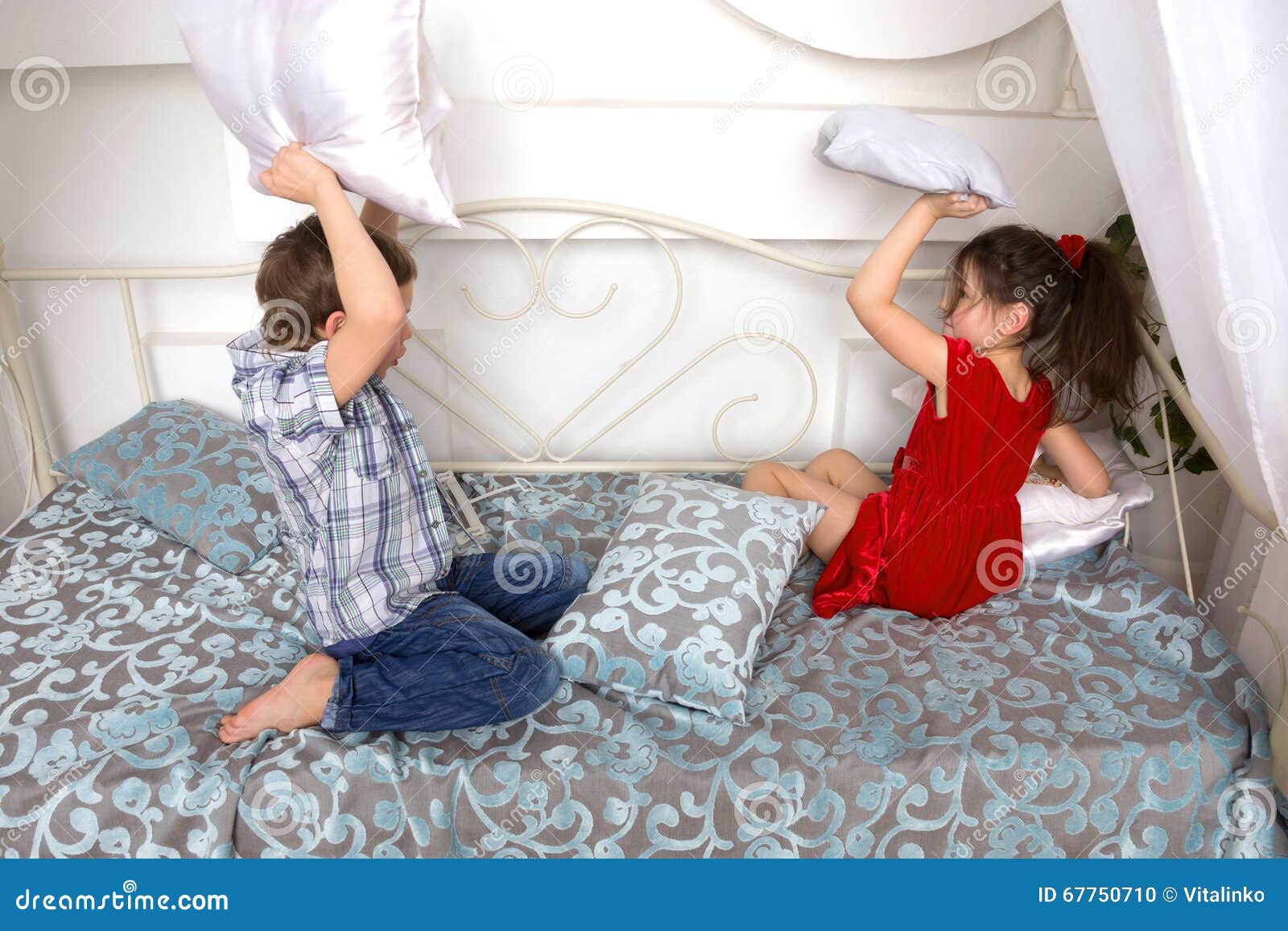 boy and girl in the bed