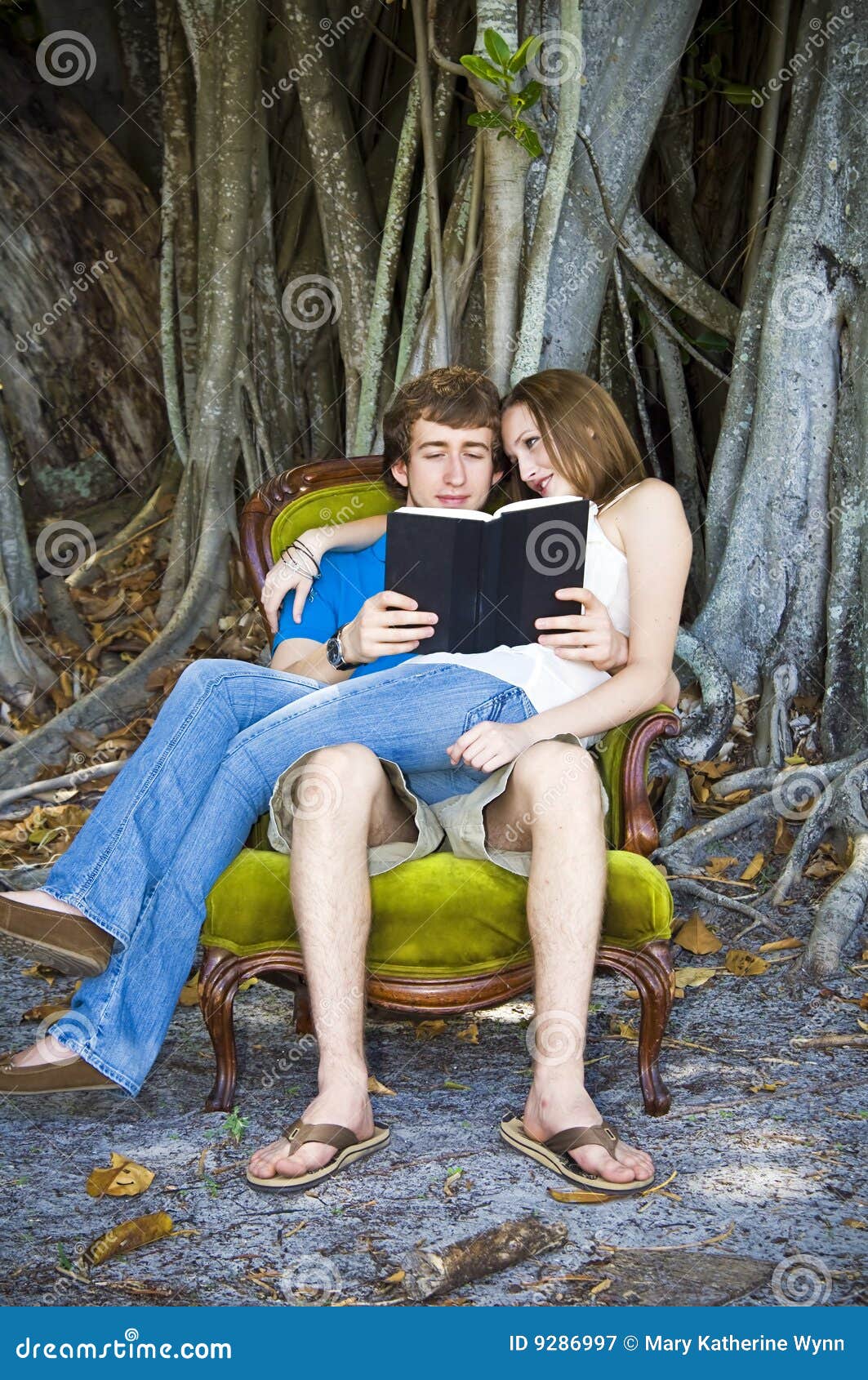 Girl Sitting On Boy Lap