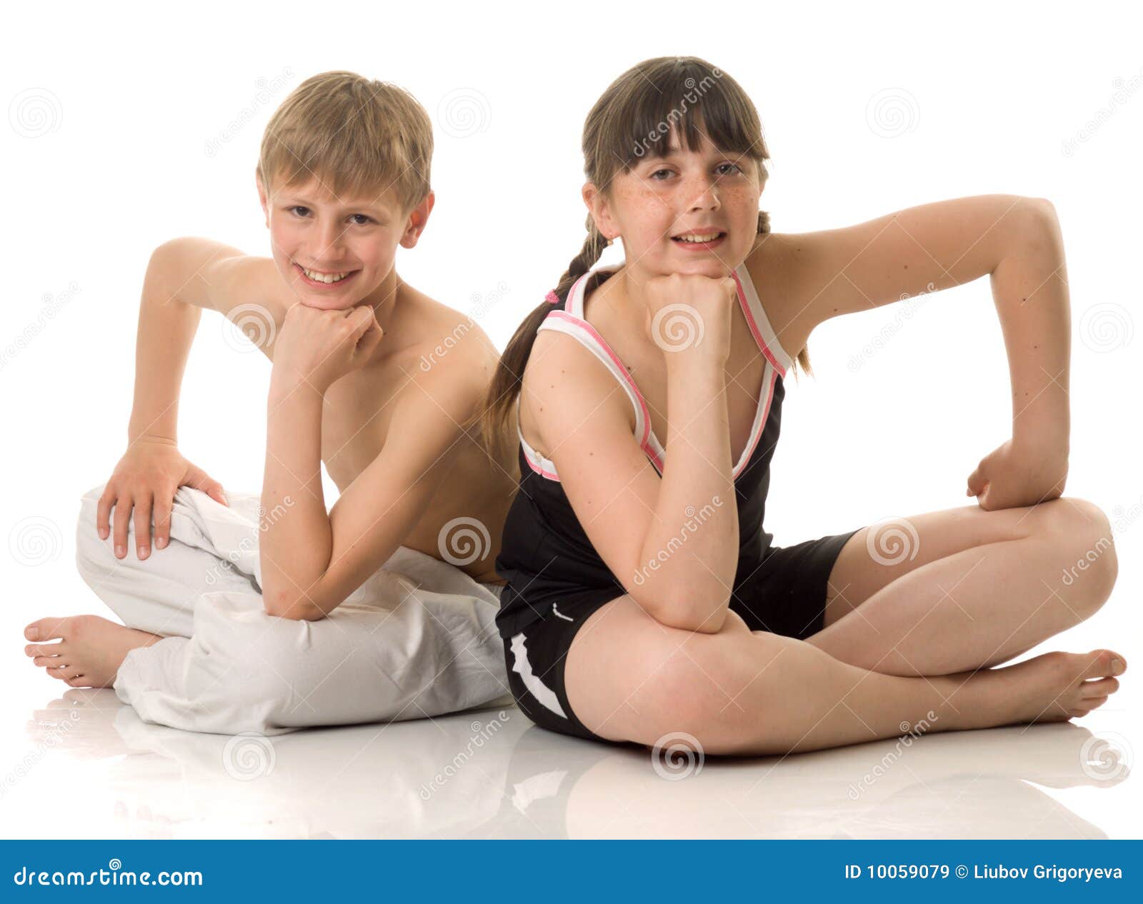 Supple Massage Embryo The boy and girl at sport stock image. Image of child - 10059079