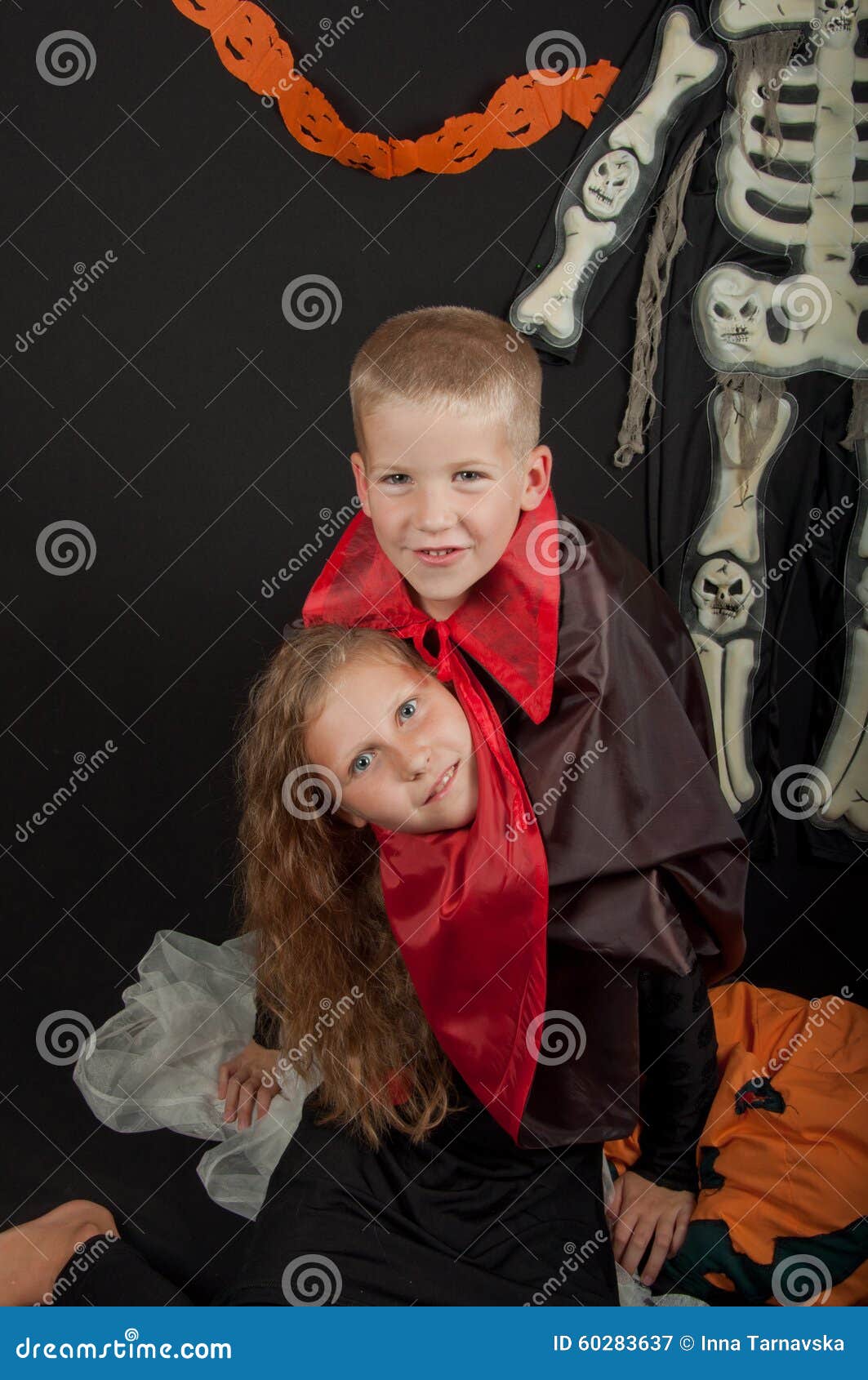 The Boy and Girl Wearing Halloween Costumes Stock Image - Image of ...