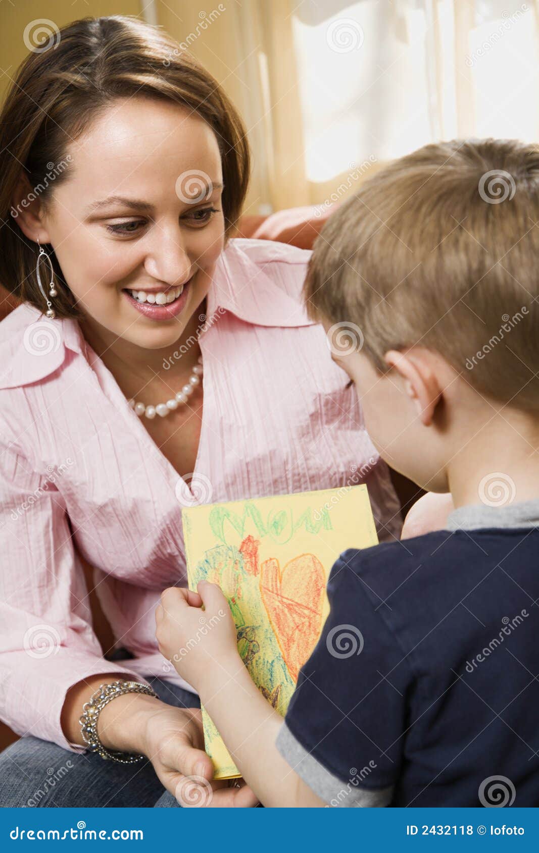 Boy Giving Mom A Drawing Stock P