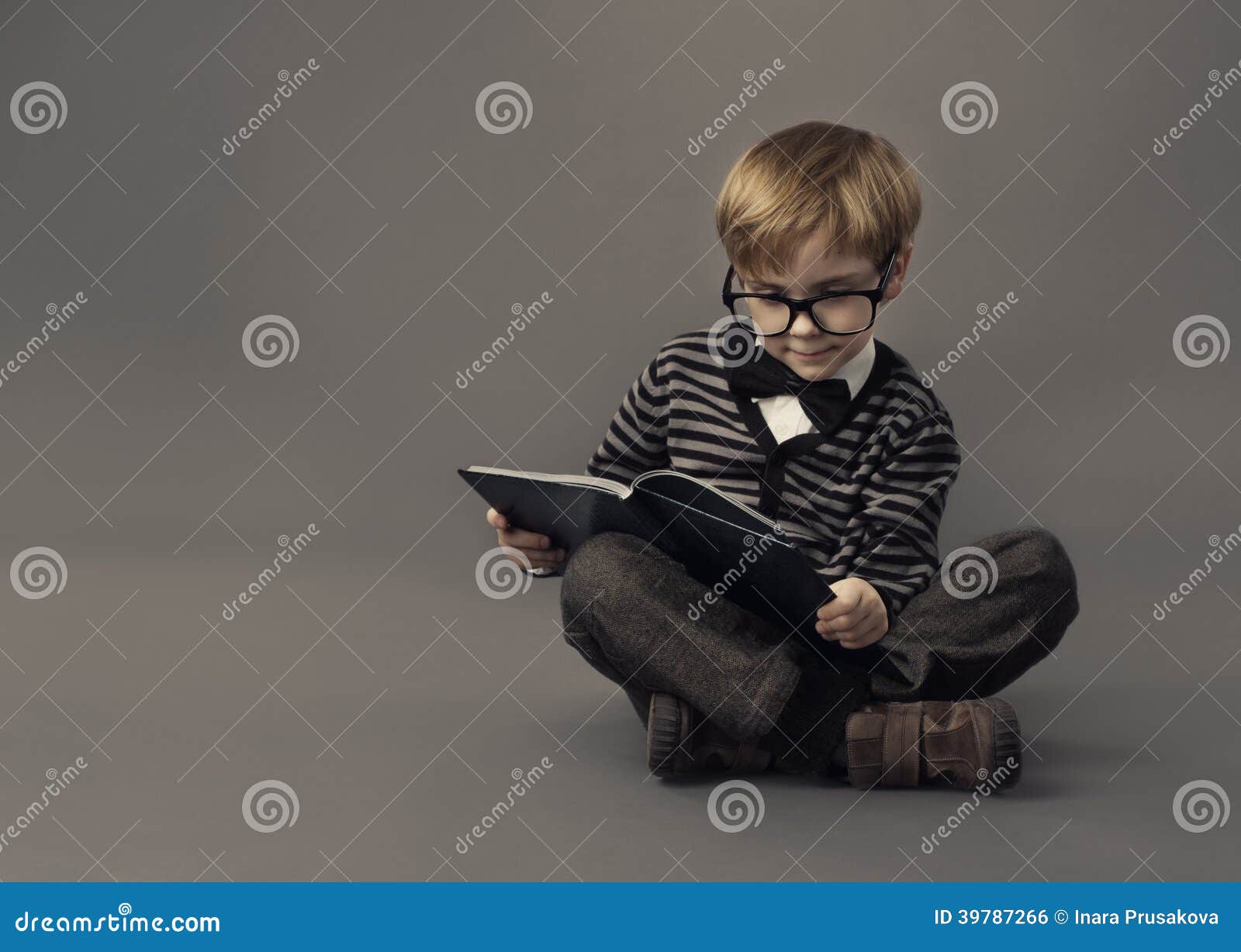 boy child read book, clever kid in glasses, children education