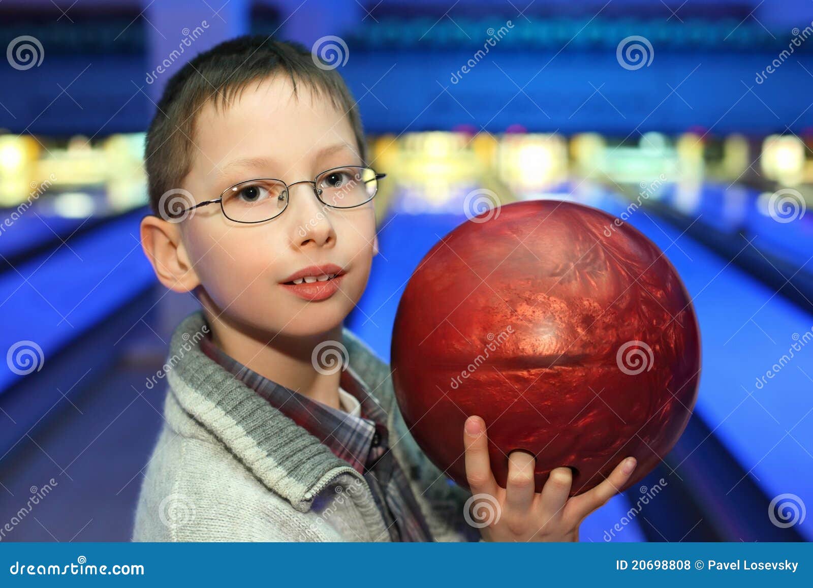 Boy in Glasses, Which Hold Ball for Bowling Stock Photo Image of