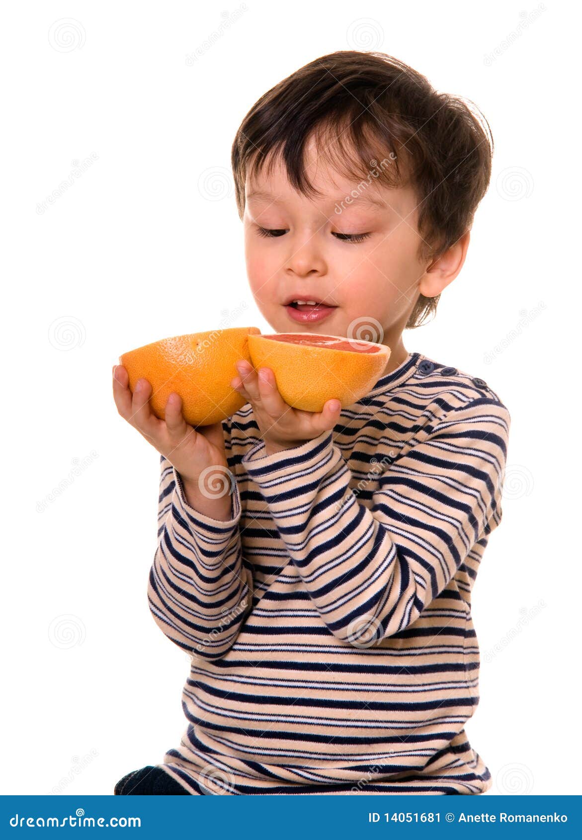 Boy with grapefruit. stock image. Image of grapefruit 14051681