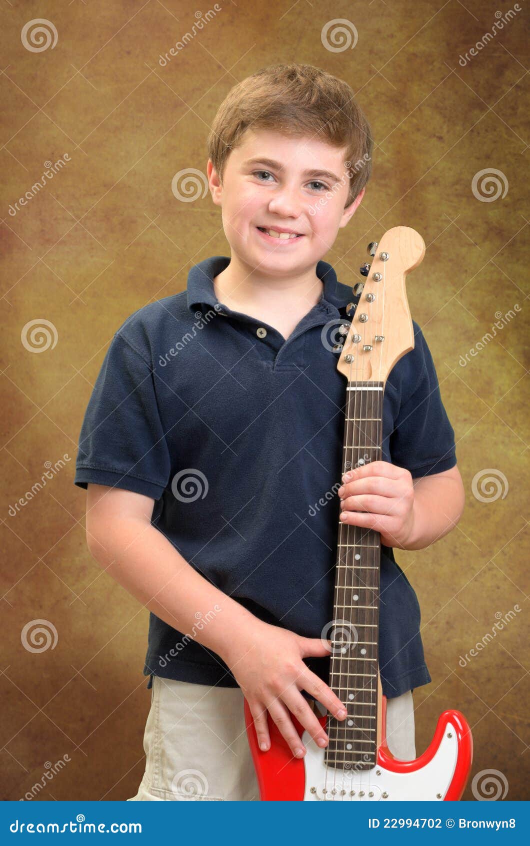 Boy with Guitar stock photo. Image of proud, vertical 22994702