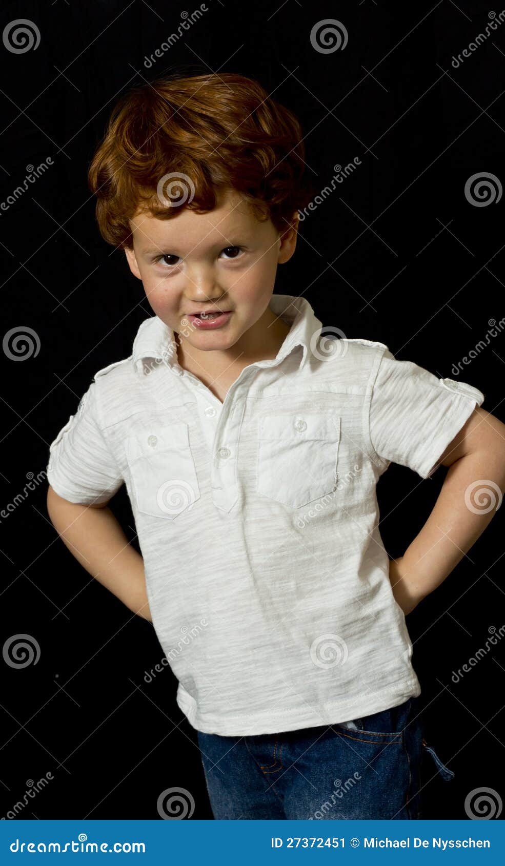 Boy with hands on hips stock image. Image of staring 27372451