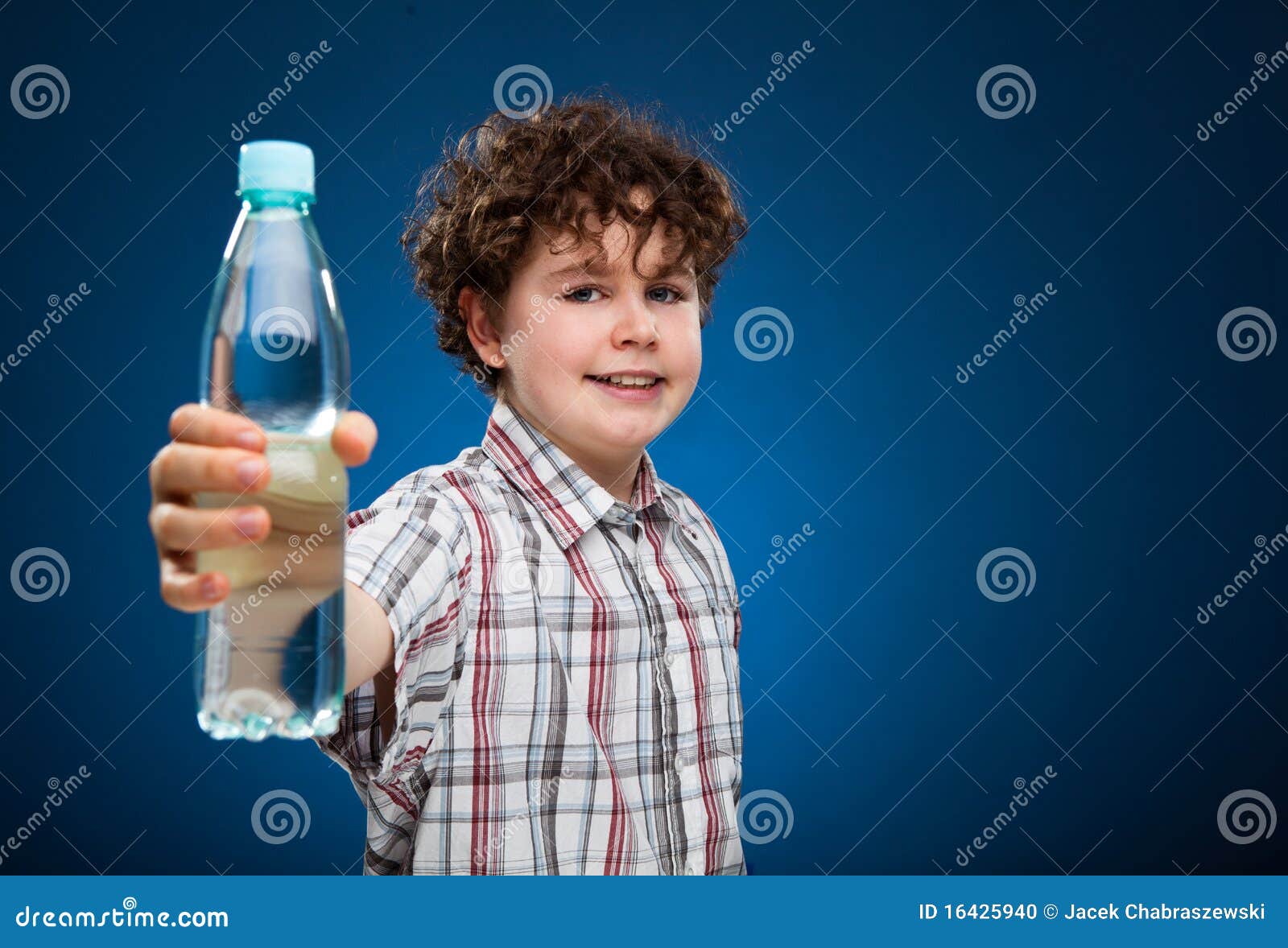 Boy Holding Bottle of Water Stock Photo Image of hydrate, drink 16425940