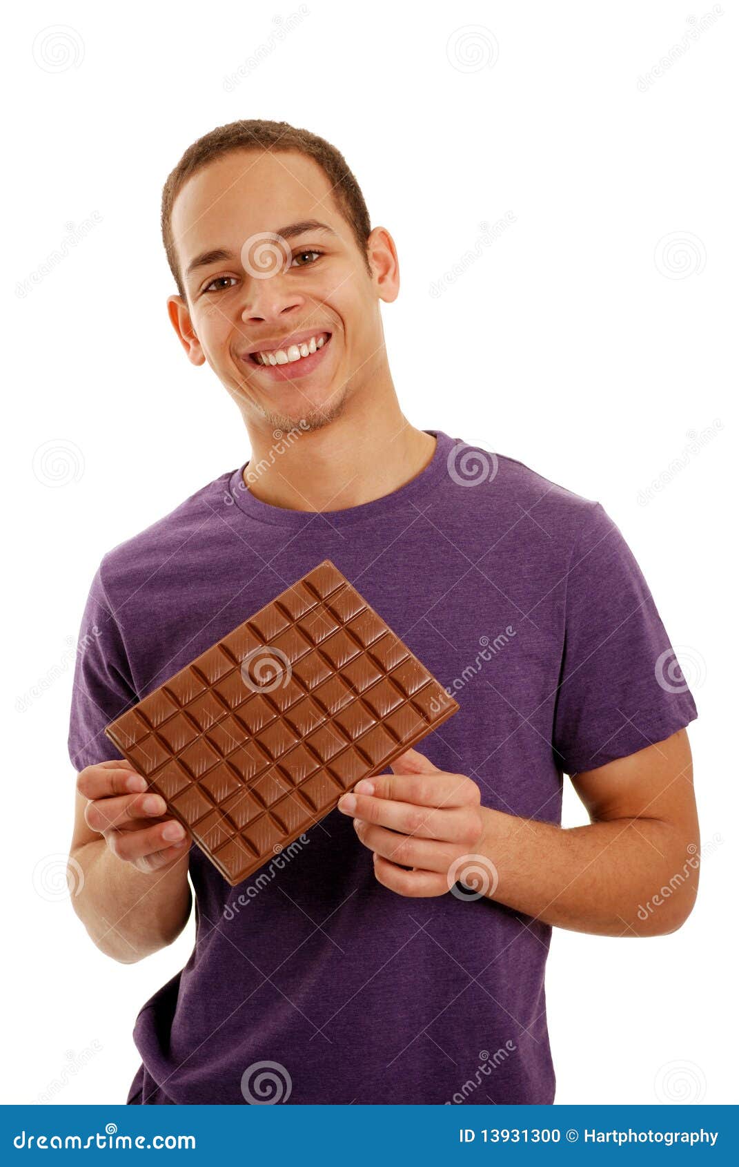 Boy holding chocolate bar stock photo. Image of huge 13931300