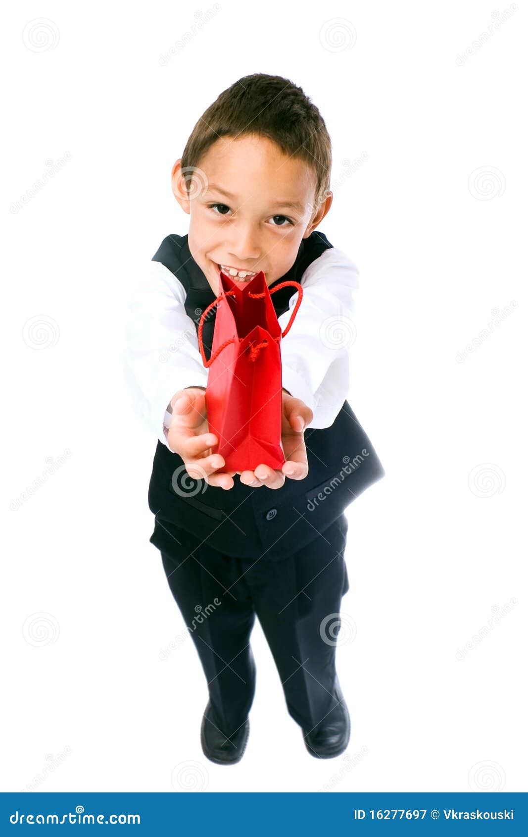 Boy holding red bag stock image. Image of joyful, adorable 16277697