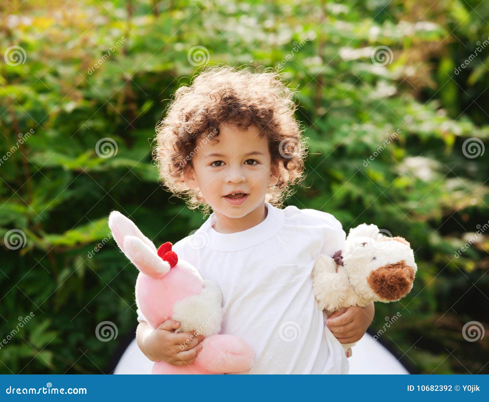 Boy is holding toys stock photo. Image of small, warm 10682392