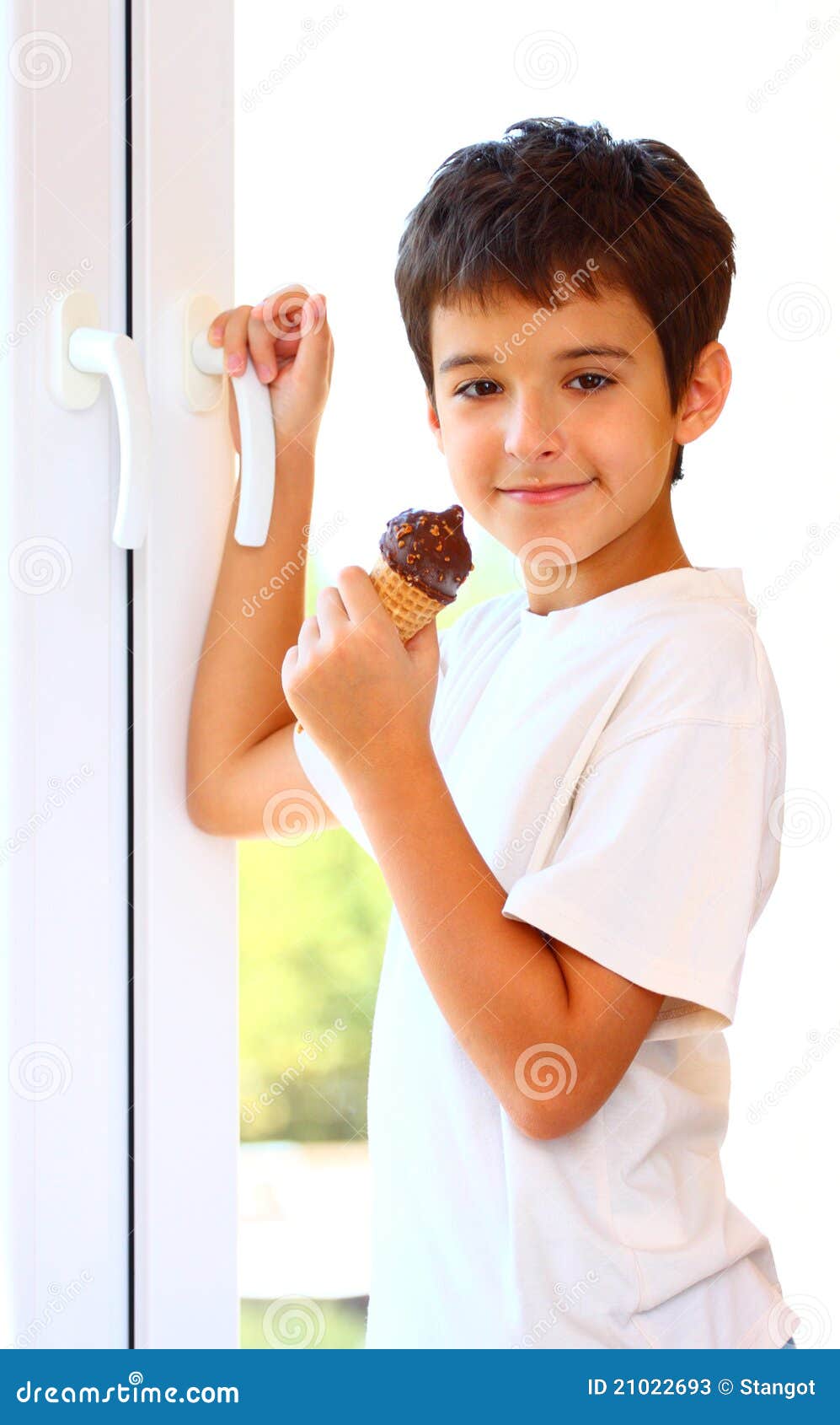 Boy with ice cream stock image. Image of holding, white 21022693